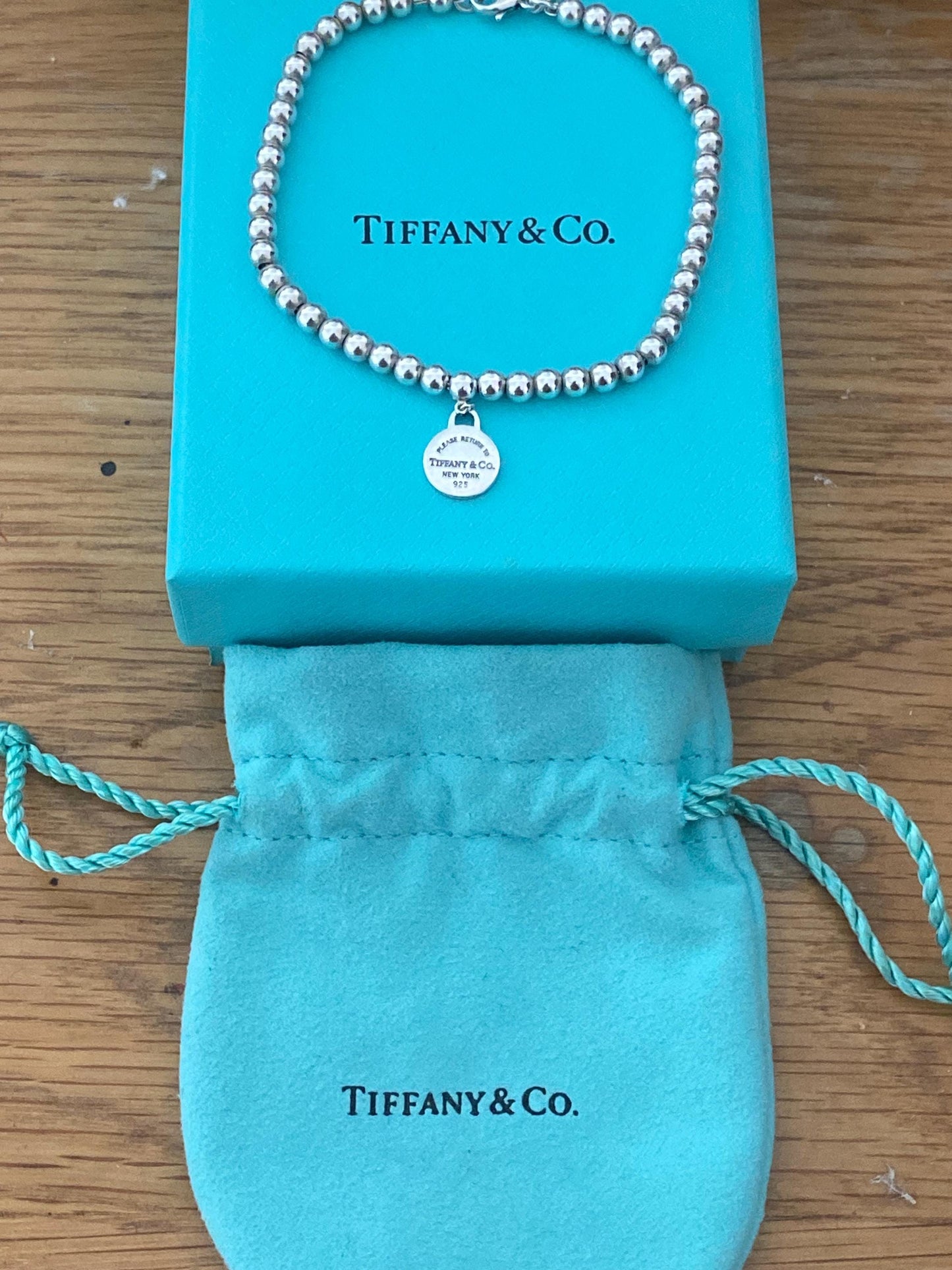 Tiffany & Co beaded sterling silver circle charm bracelet, Genuine, 7.5” long, with box and pouch