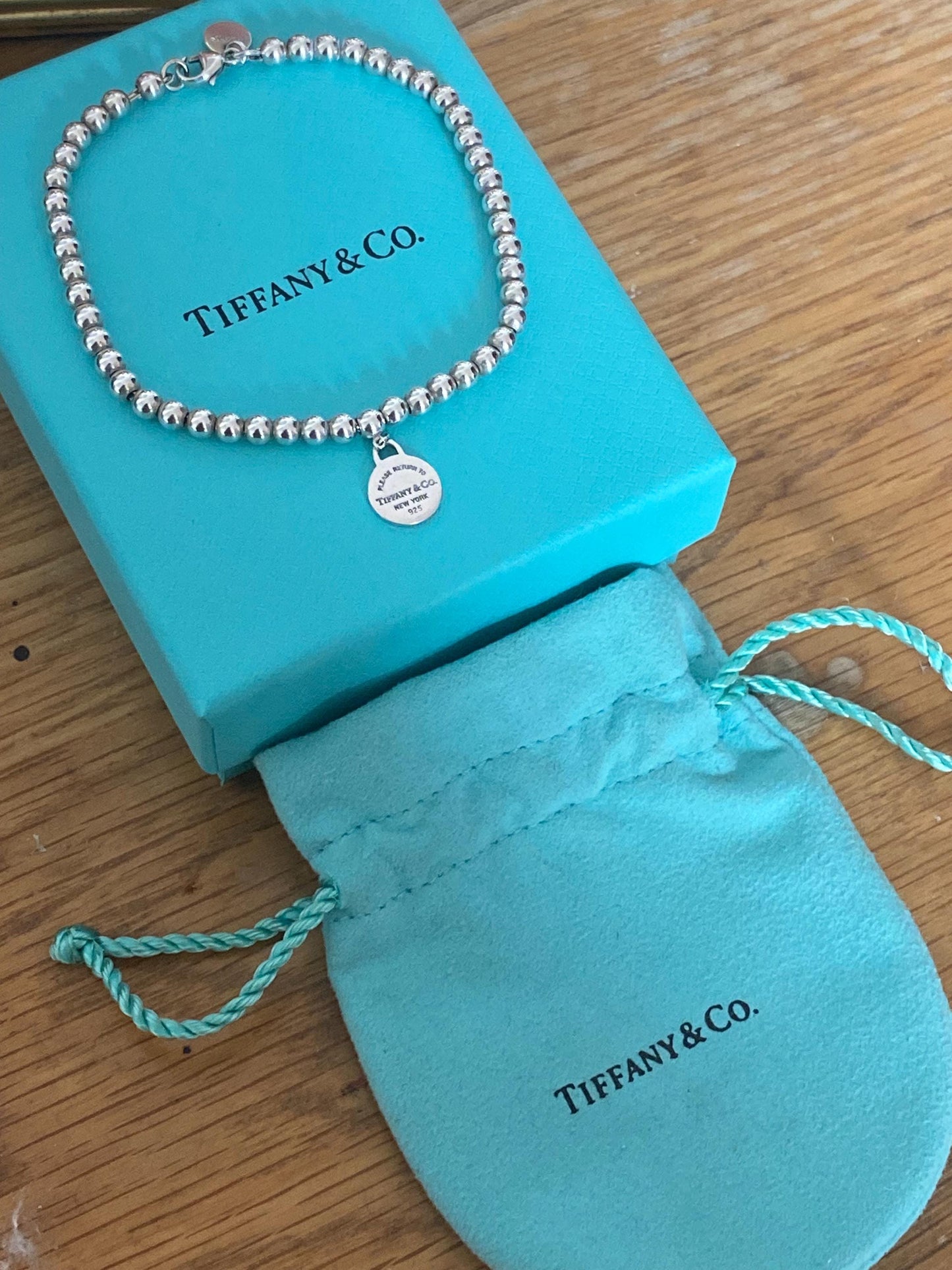 Tiffany & Co beaded sterling silver circle charm bracelet, Genuine, 7.5” long, with box and pouch