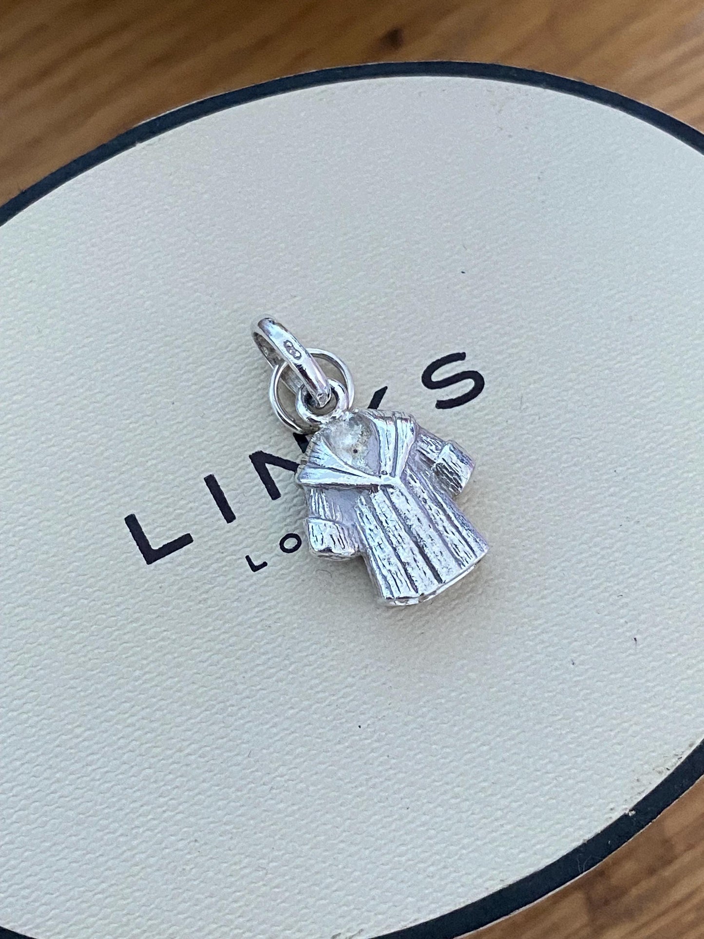 Beautiful genuine rare Links of London sterling silver winter coat charm