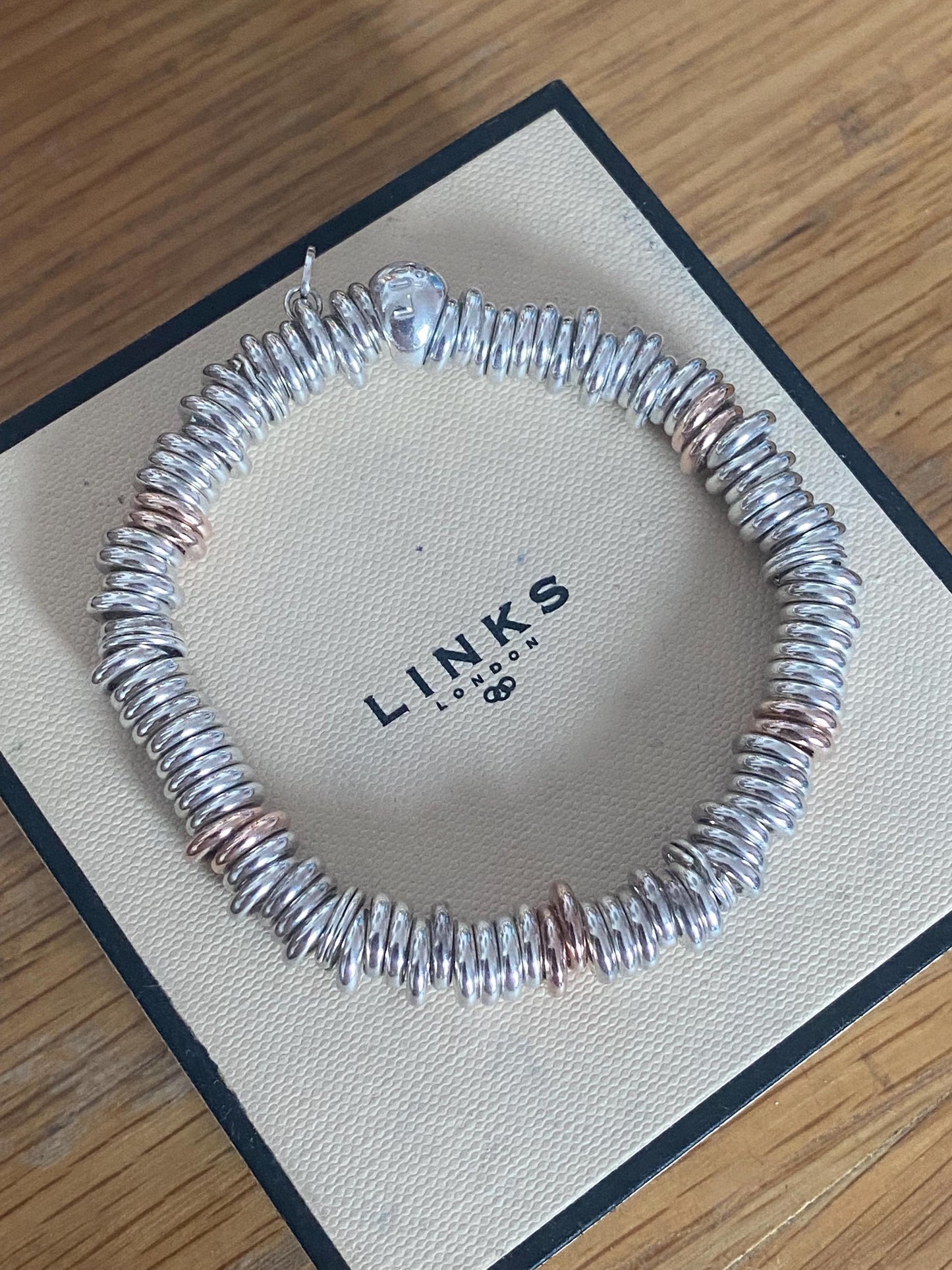 Lovely Links of London vintage rare sweetie bracelet, sterling silver and 18k rose gold vermeil, medium