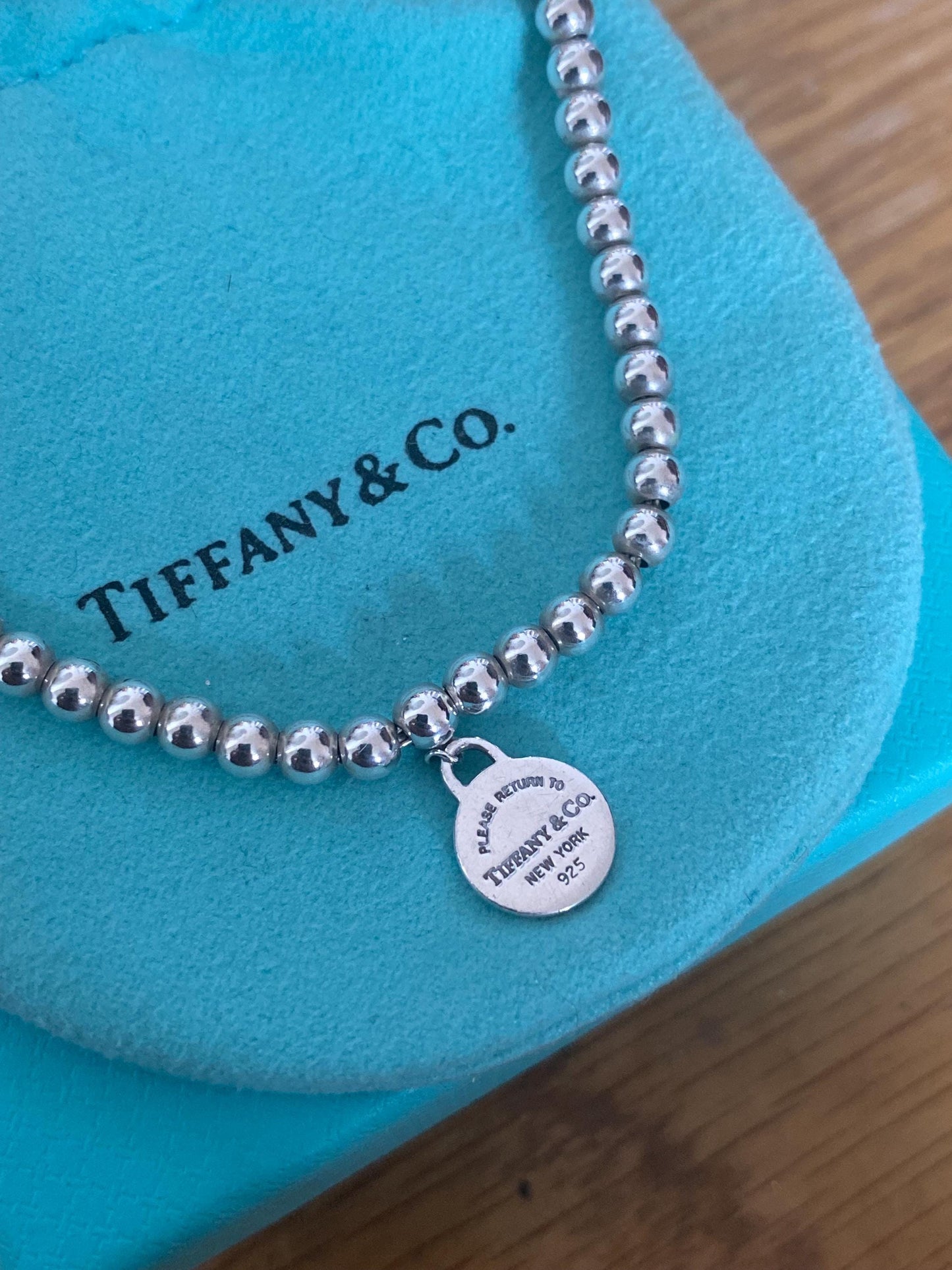 Tiffany & Co beaded sterling silver circle charm bracelet, Genuine, 7.5” long, with box and pouch