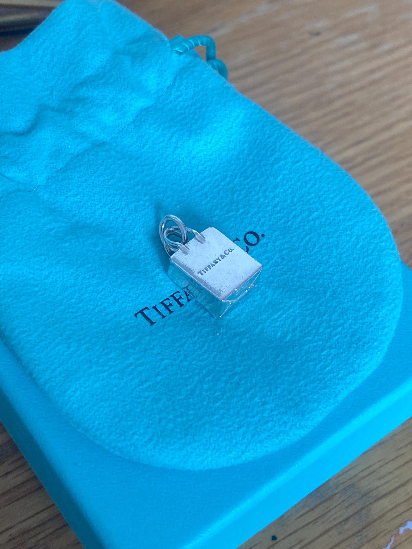 Very rare Tiffany & Co sterling silver shopping bag charm, Genuine