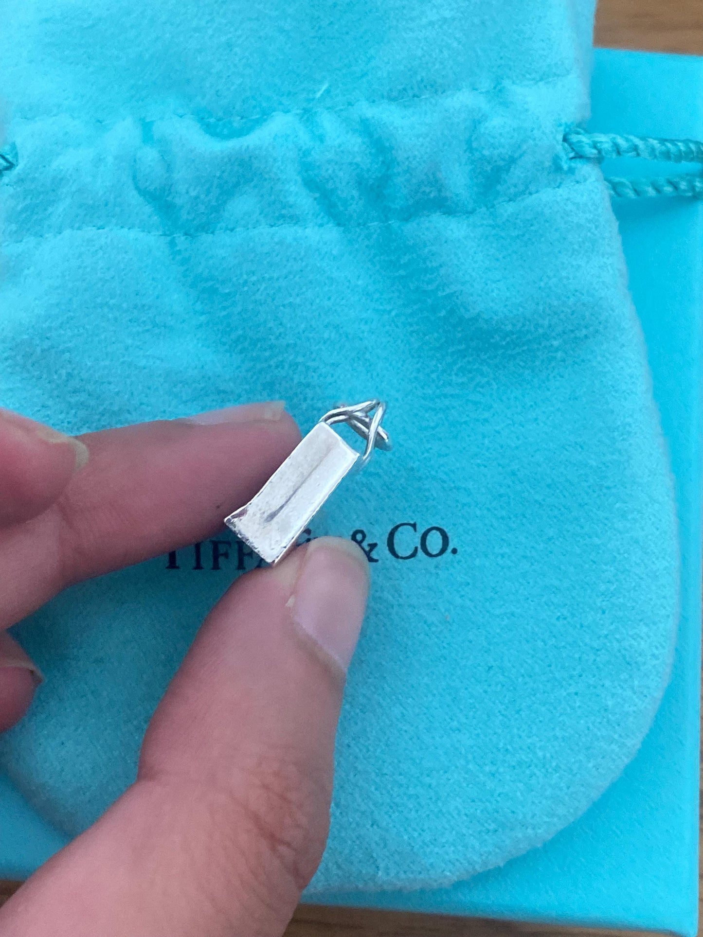 Very rare Tiffany & Co sterling silver shopping bag charm, Genuine