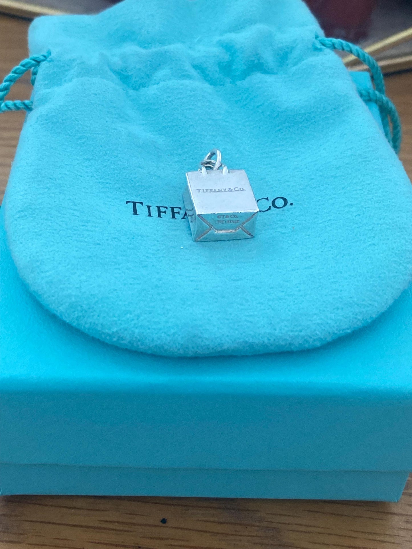Very rare Tiffany & Co sterling silver shopping bag charm, Genuine