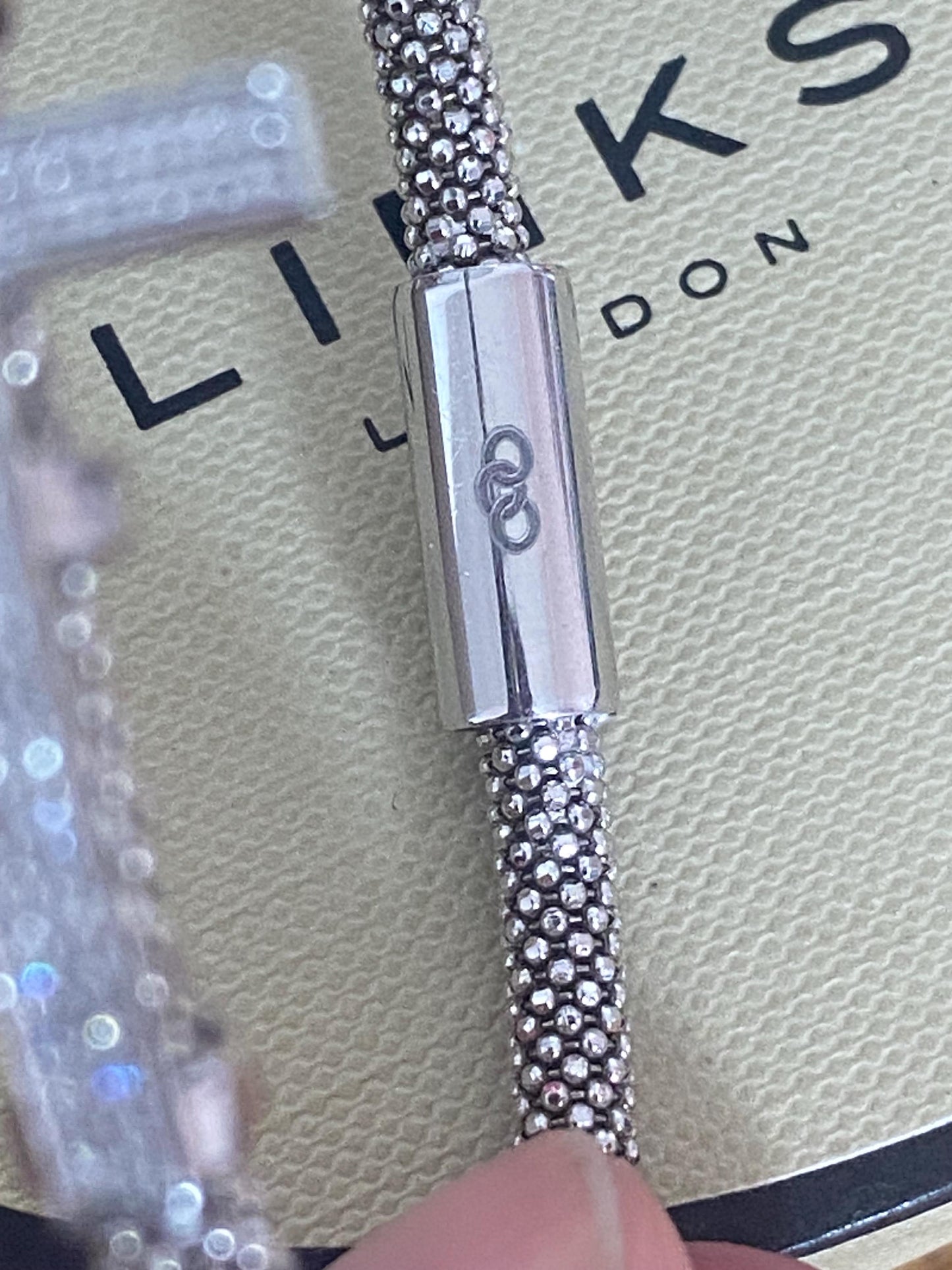 Very rare Links of London vintage rare effervescence cross charm sapphire bracelet with magnetic closure