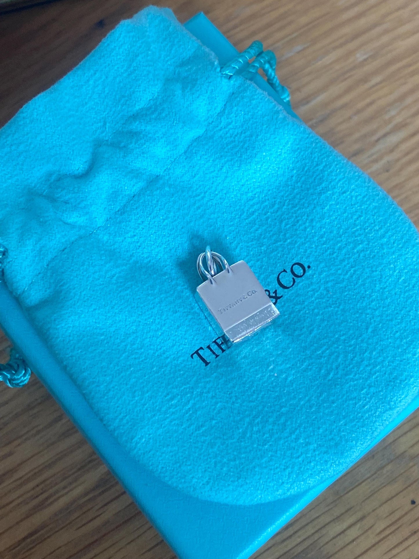 Very rare Tiffany & Co sterling silver shopping bag charm, Genuine