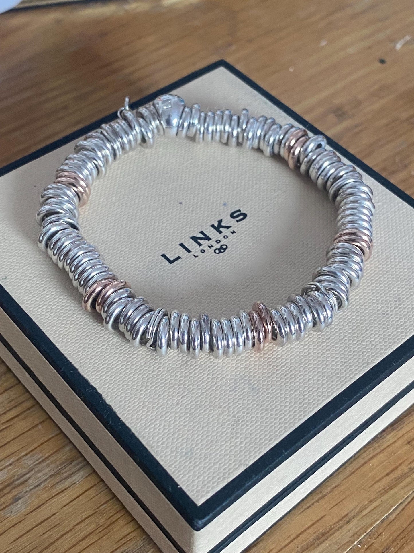 Lovely Links of London vintage rare sweetie bracelet, sterling silver and 18k rose gold vermeil, medium