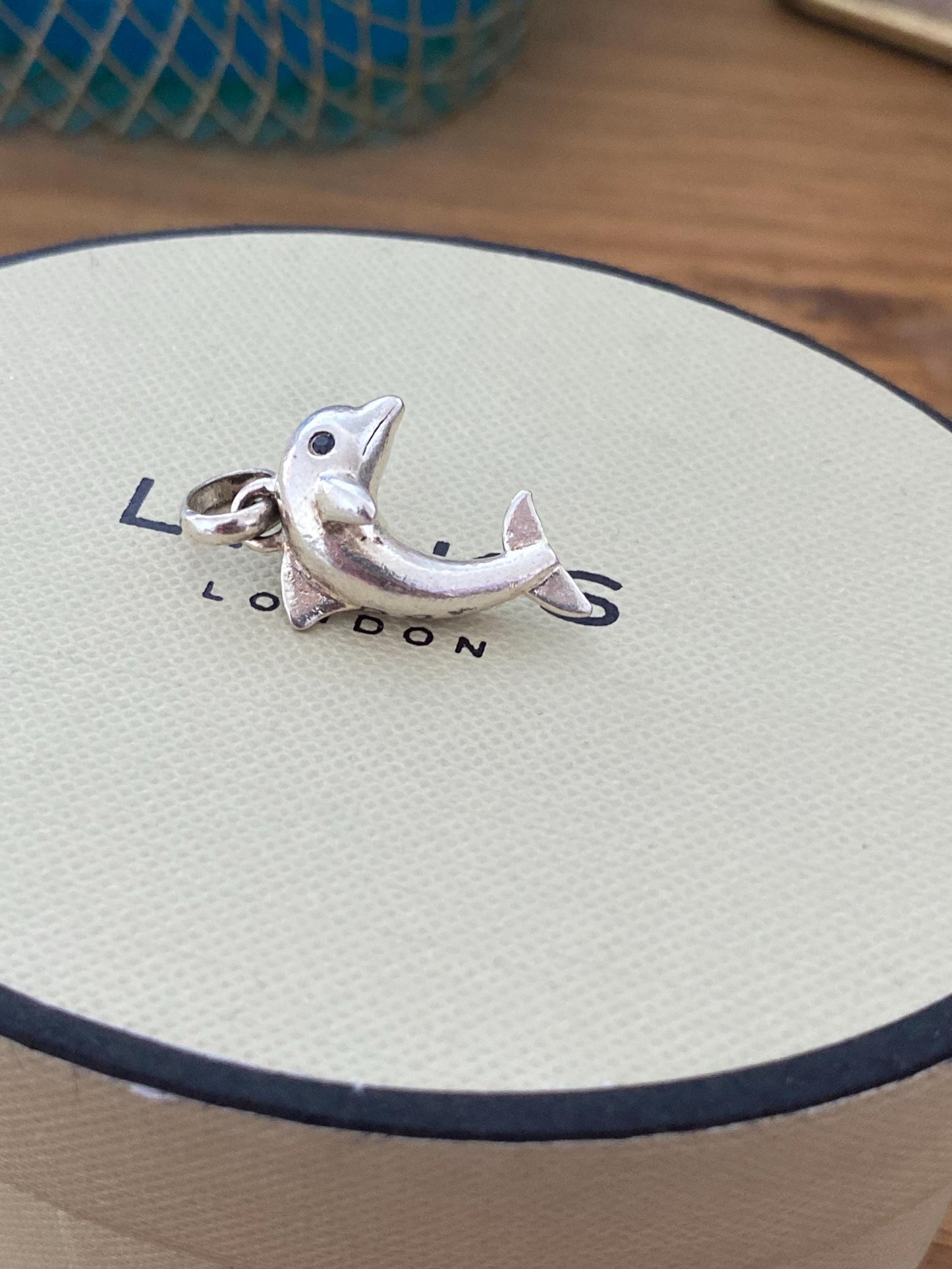 Stunning genuine rare Links of London sterling silver dolphin hallmarked charm with sapphire blue eyes