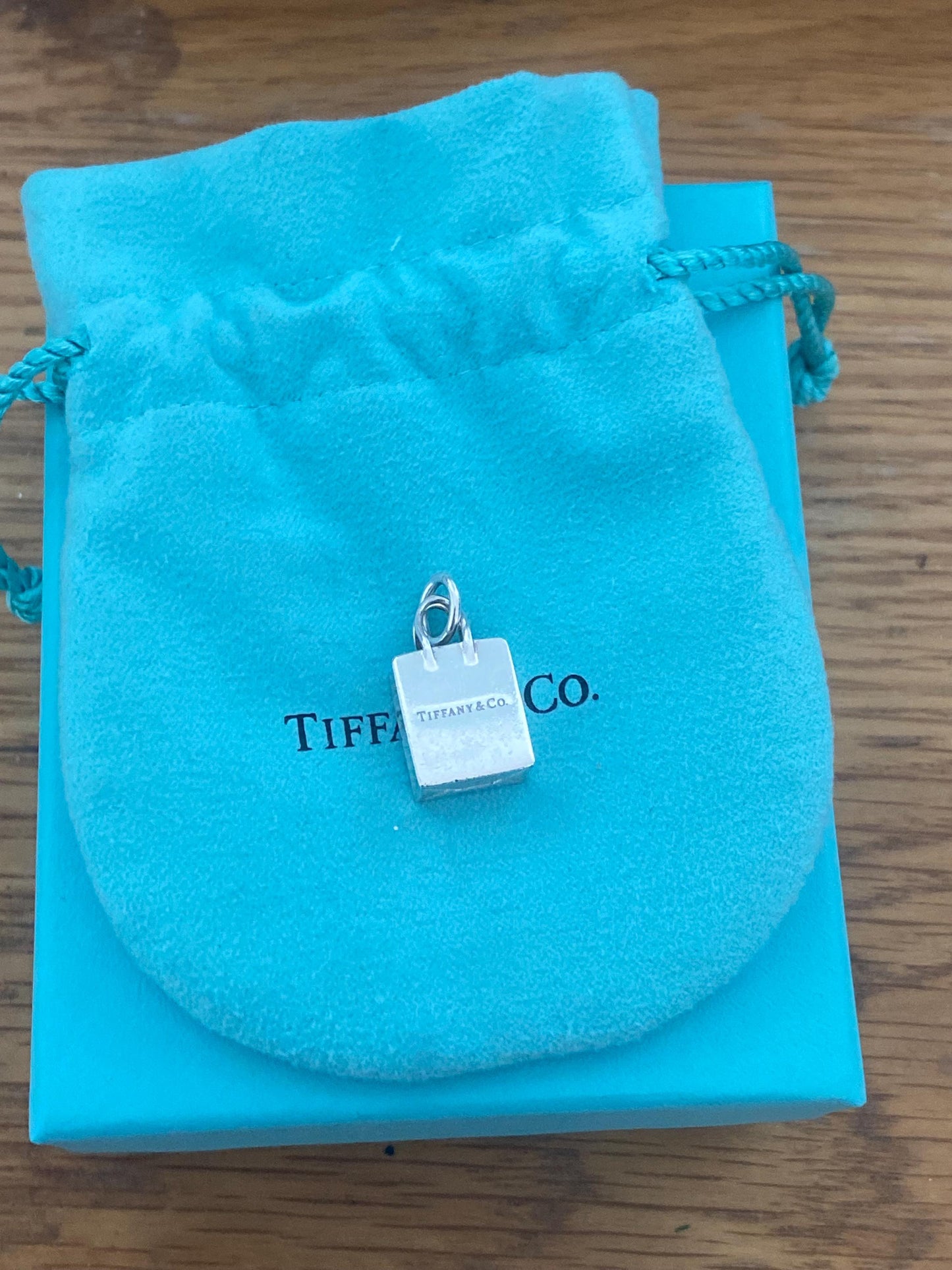 Very rare Tiffany & Co sterling silver shopping bag charm, Genuine
