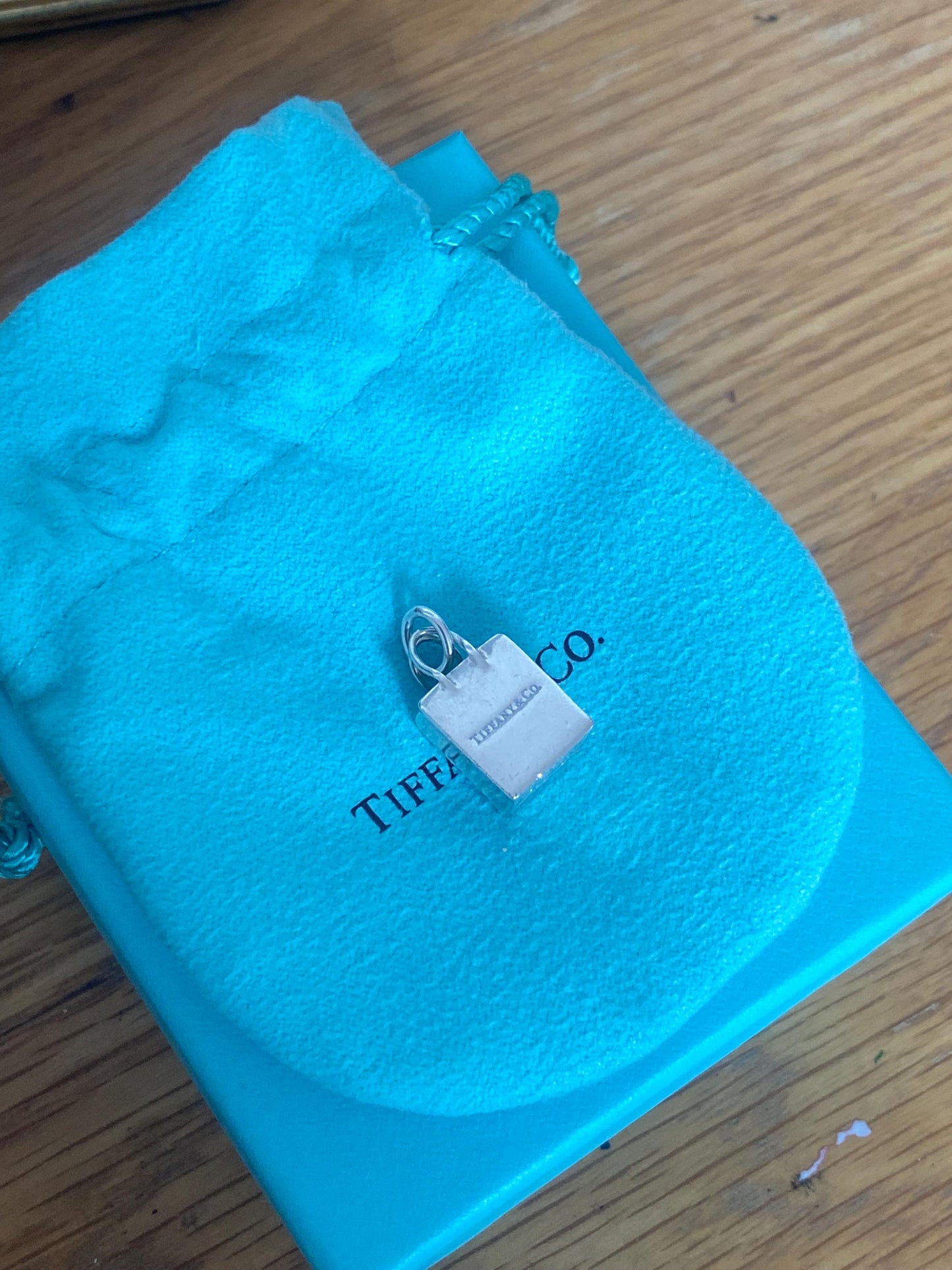 Very rare Tiffany & Co sterling silver shopping bag charm, Genuine