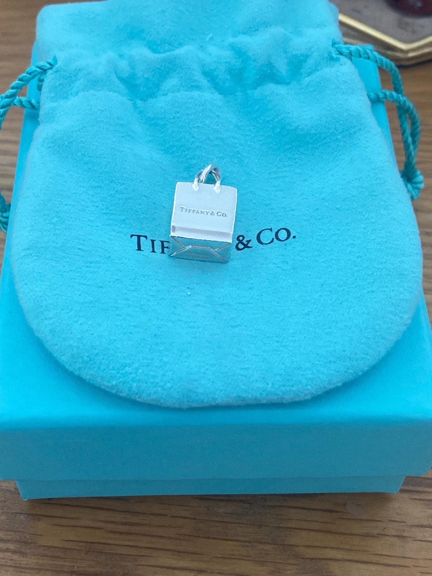 Very rare Tiffany & Co sterling silver shopping bag charm, Genuine