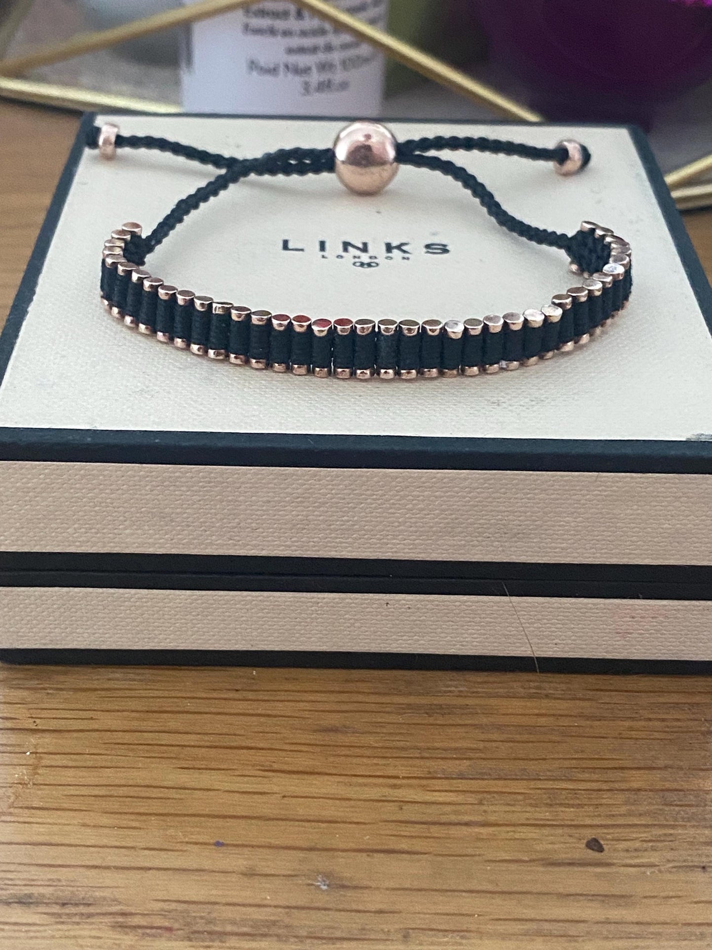 Stunning Links of London Mini Friendship Bracelet in black and 18k Rose Gold Vermeil Stamped, Hallmarked