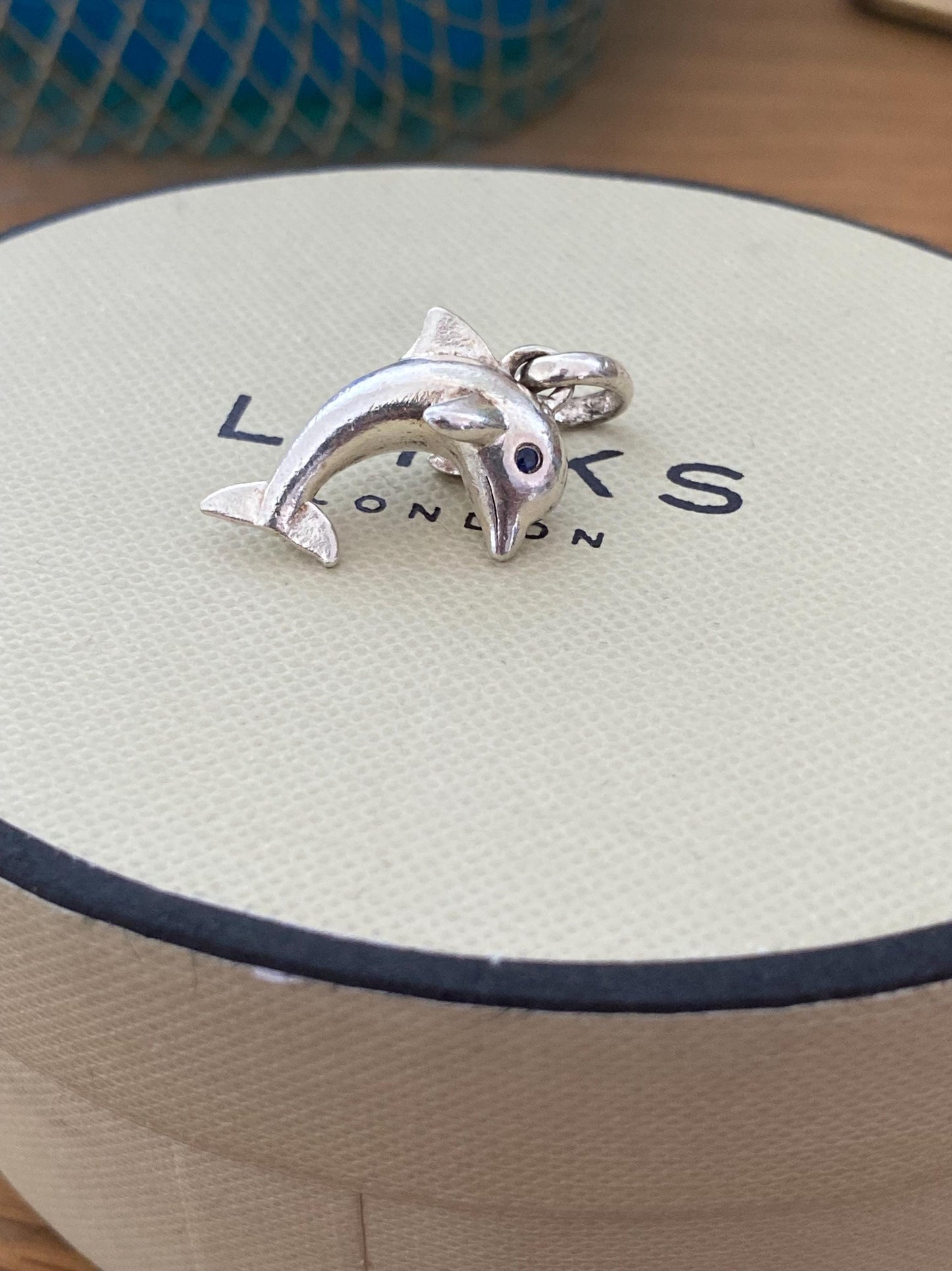 Stunning genuine rare Links of London sterling silver dolphin hallmarked charm with sapphire blue eyes