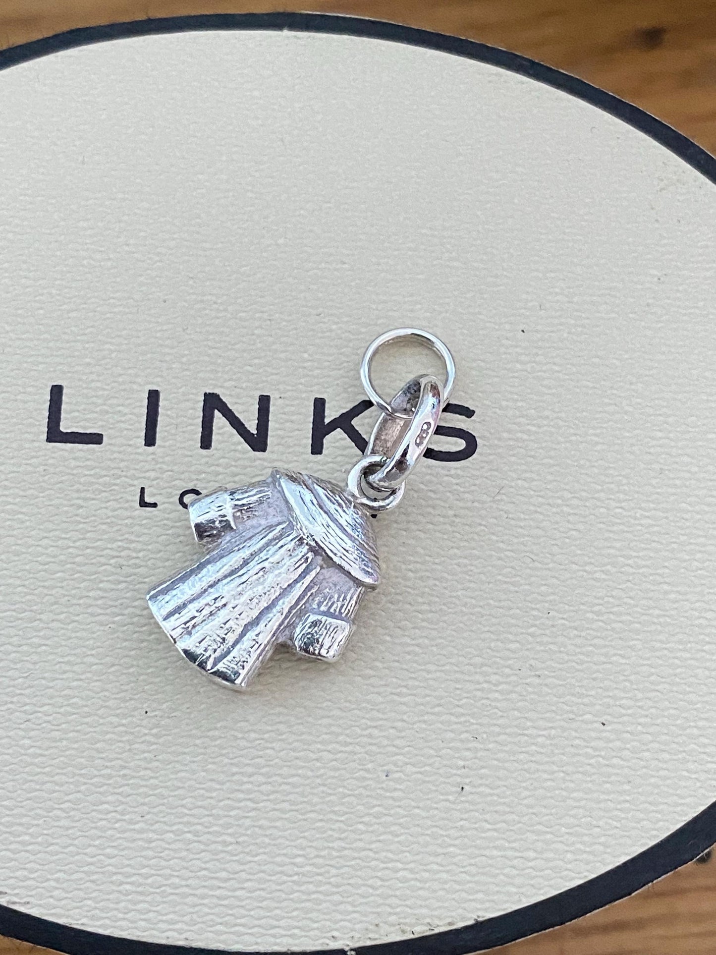 Beautiful genuine rare Links of London sterling silver winter coat charm