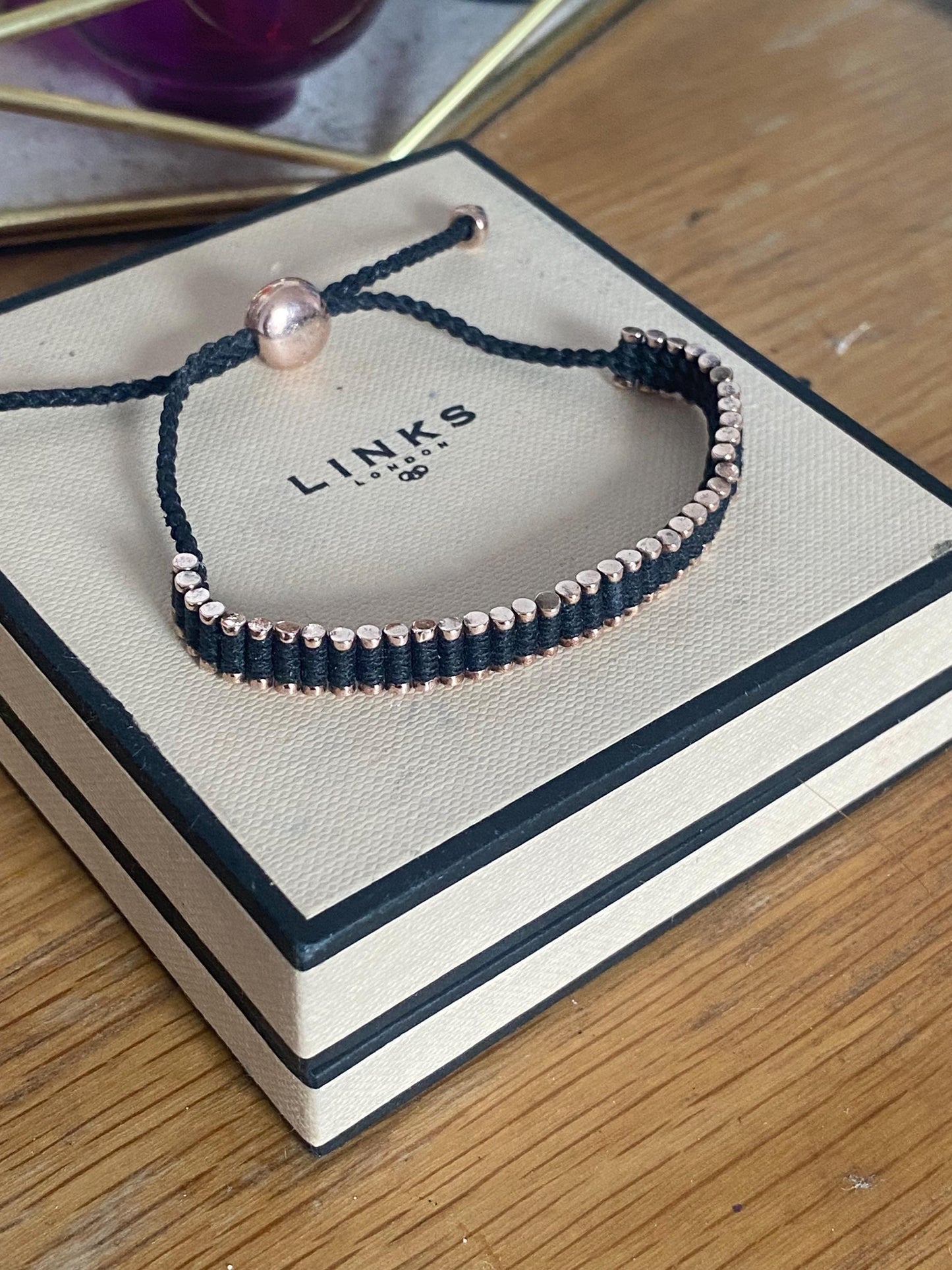 Stunning Links of London Mini Friendship Bracelet in black and 18k Rose Gold Vermeil Stamped, Hallmarked