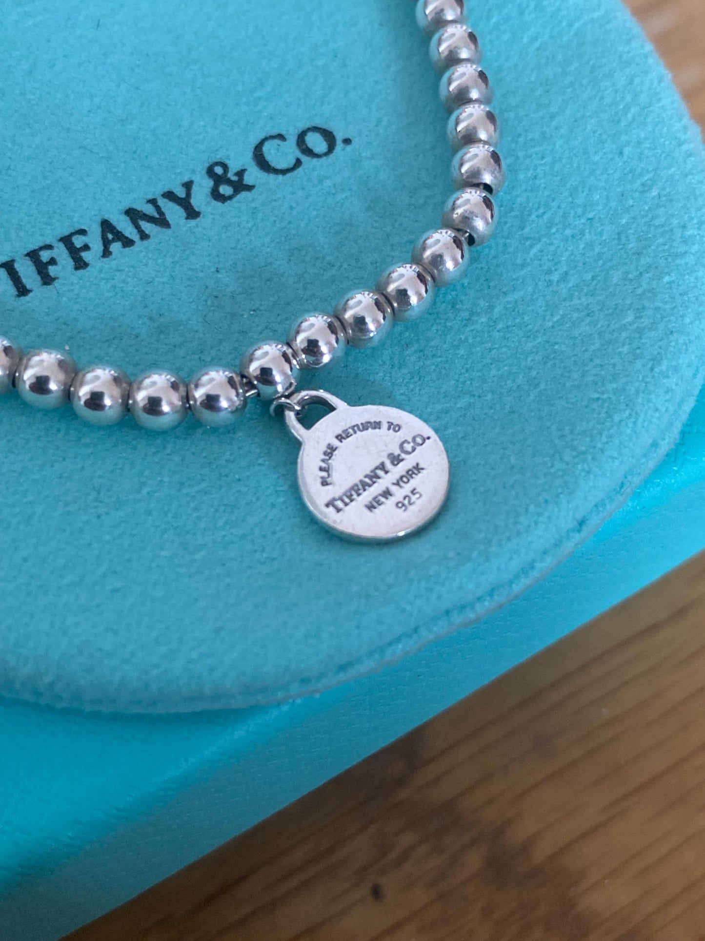 Tiffany & Co beaded sterling silver circle charm bracelet, Genuine, 7.5” long, with box and pouch