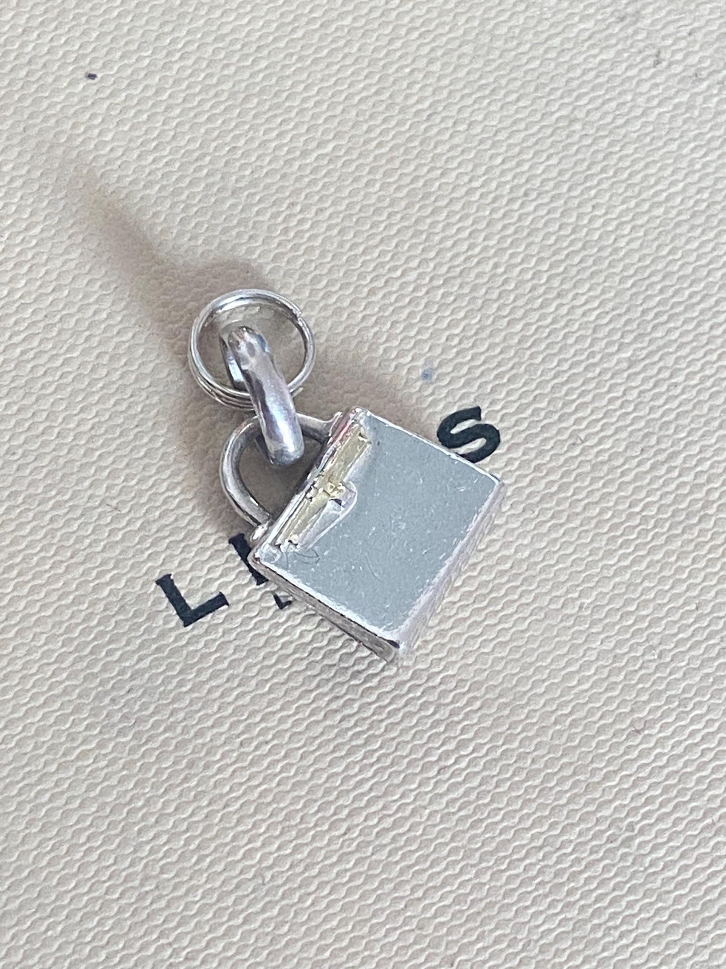 Beautiful genuine rare hallmarked Links of London sterling silver bag charm