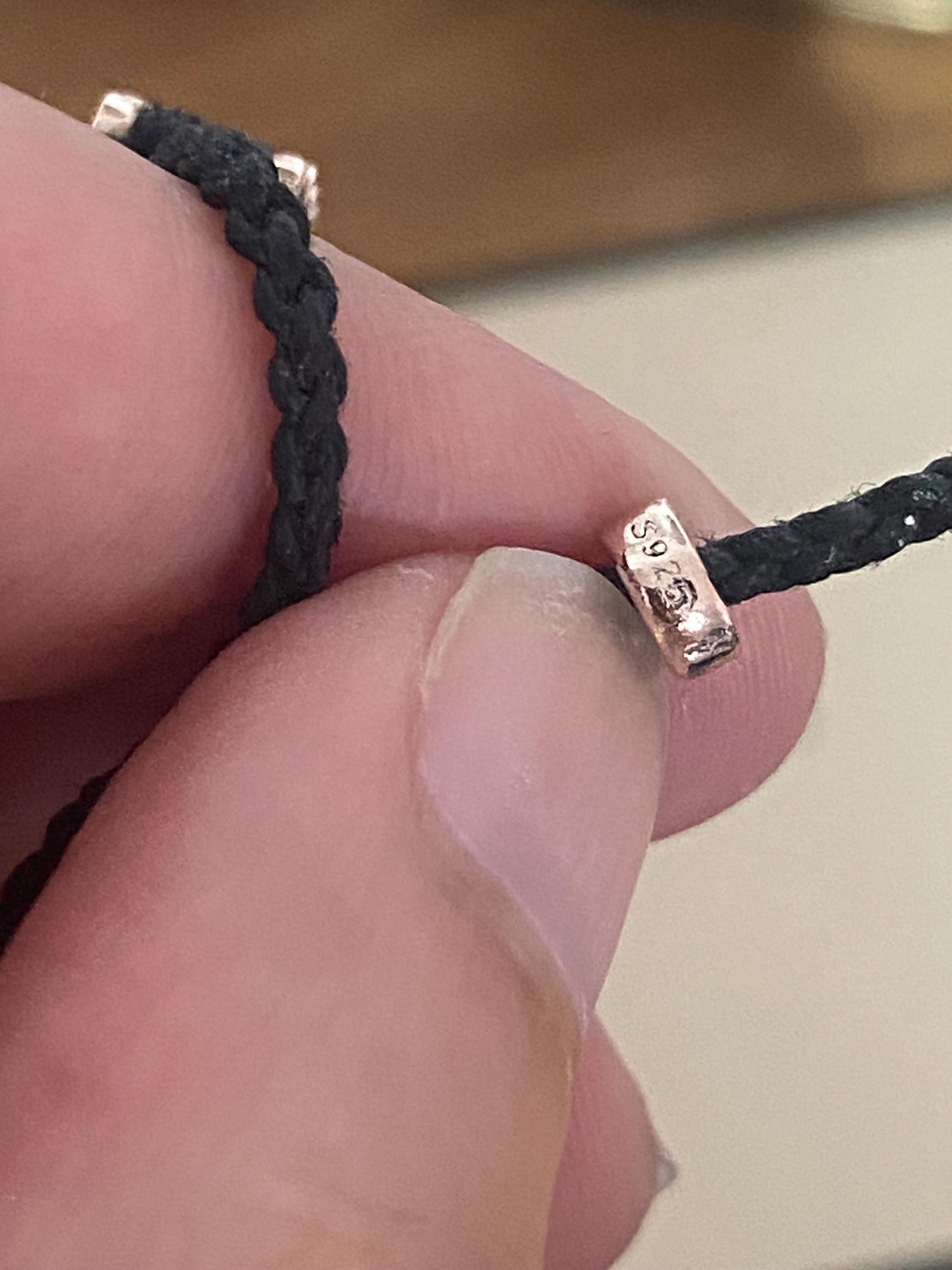 Stunning Links of London Mini Friendship Bracelet in black and 18k Rose Gold Vermeil Stamped, Hallmarked