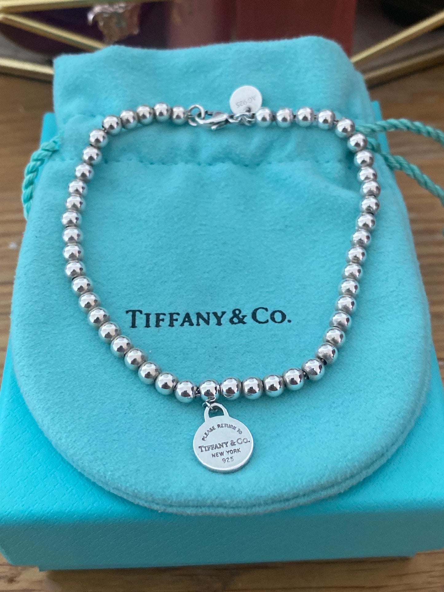 Tiffany & Co beaded sterling silver circle charm bracelet, Genuine, 7.5” long, with box and pouch