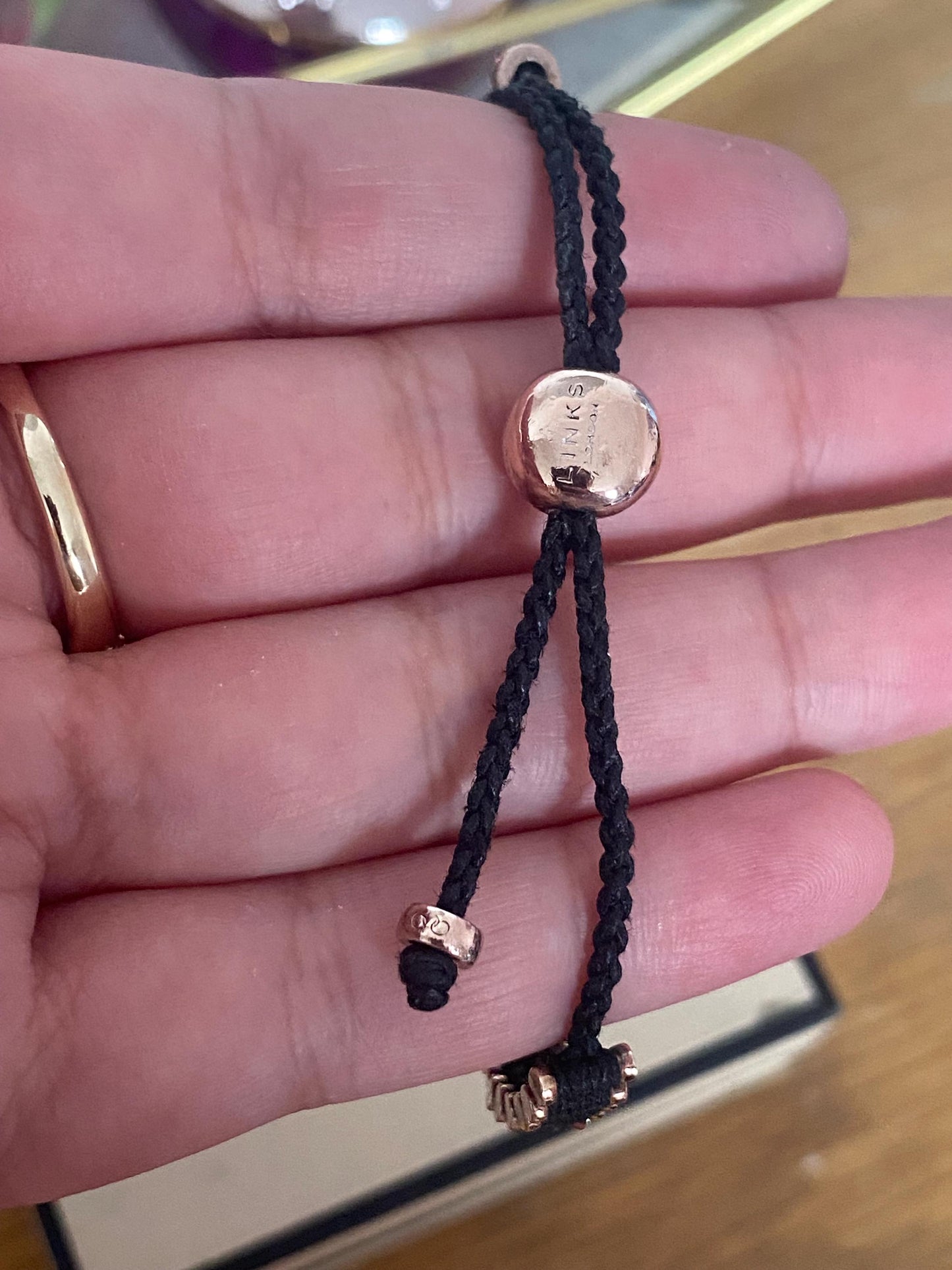 Stunning Links of London Mini Friendship Bracelet in black and 18k Rose Gold Vermeil Stamped, Hallmarked