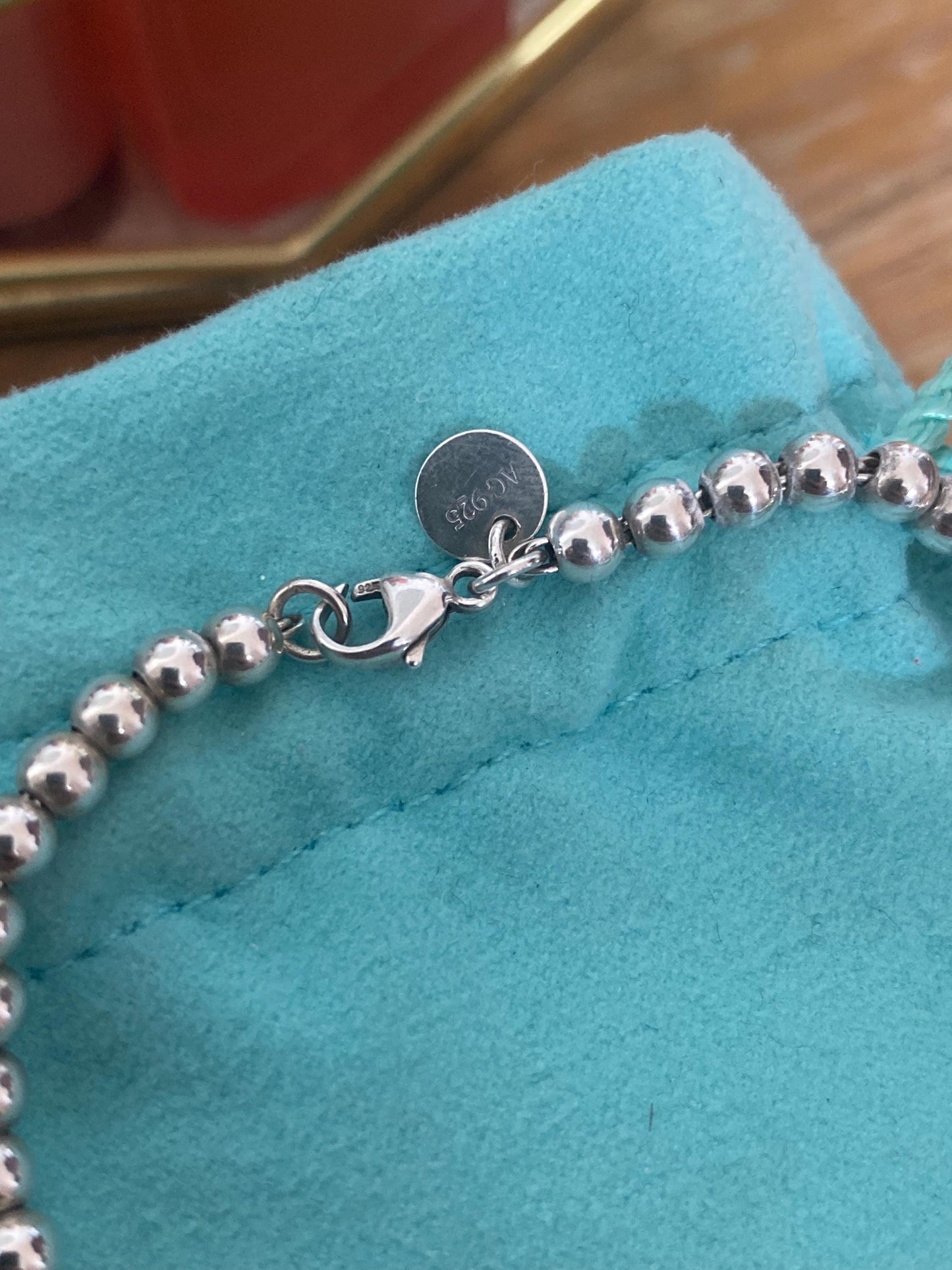 Tiffany & Co beaded sterling silver circle charm bracelet, Genuine, 7.5” long, with box and pouch