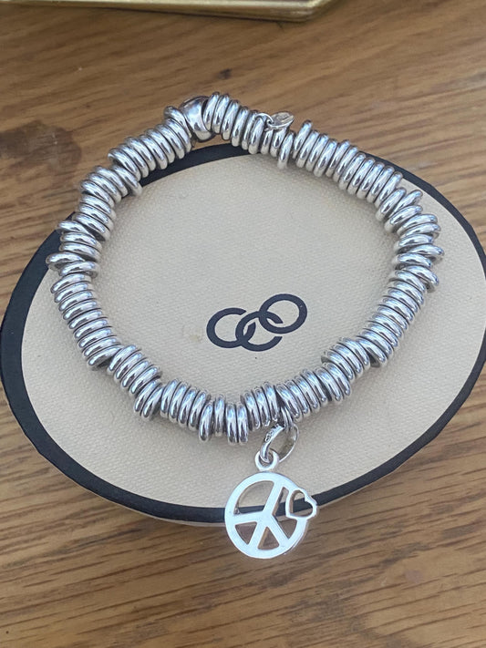 Lovely Links of London vintage rare sweetie bracelet witha peace heart charm, sterling silver, size medium, boxed