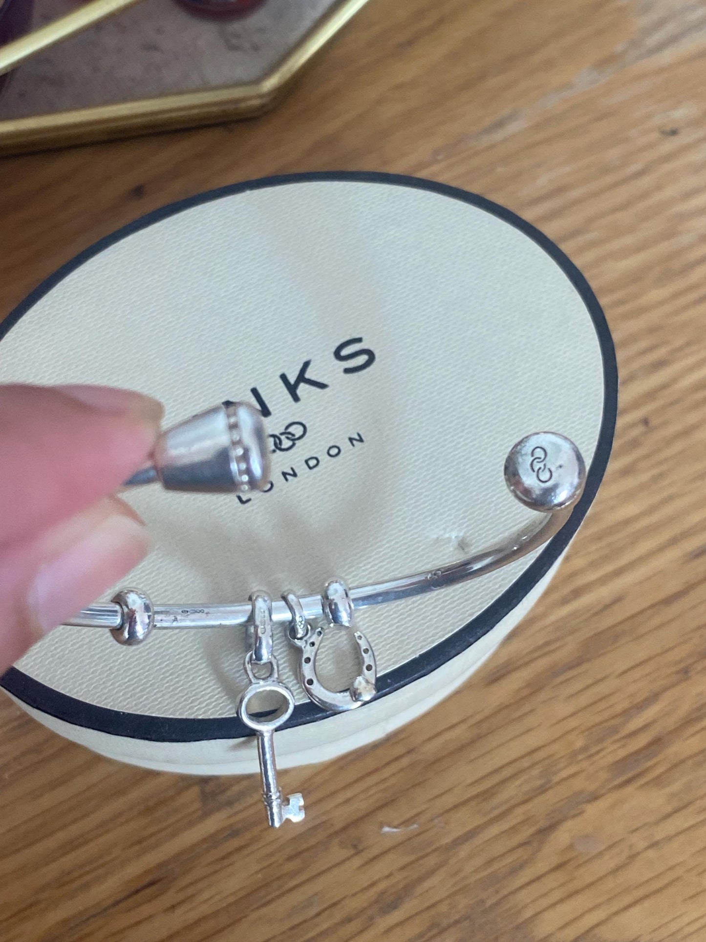 Genuine Links of London Sterling Silver Amulet Charm Cuff Bangle with two charms, Hallmarked, Medium Size, boxed