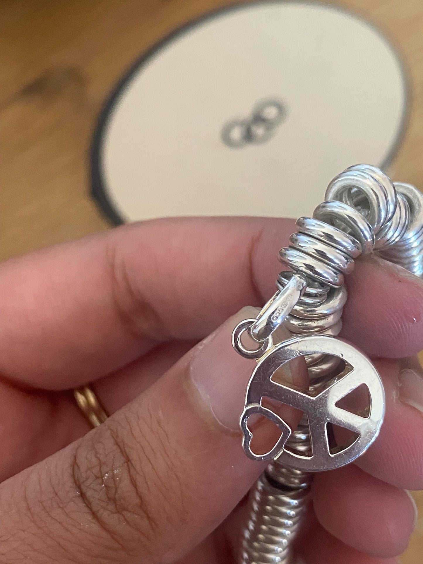 Lovely Links of London vintage rare sweetie bracelet witha peace heart charm, sterling silver, size medium, boxed