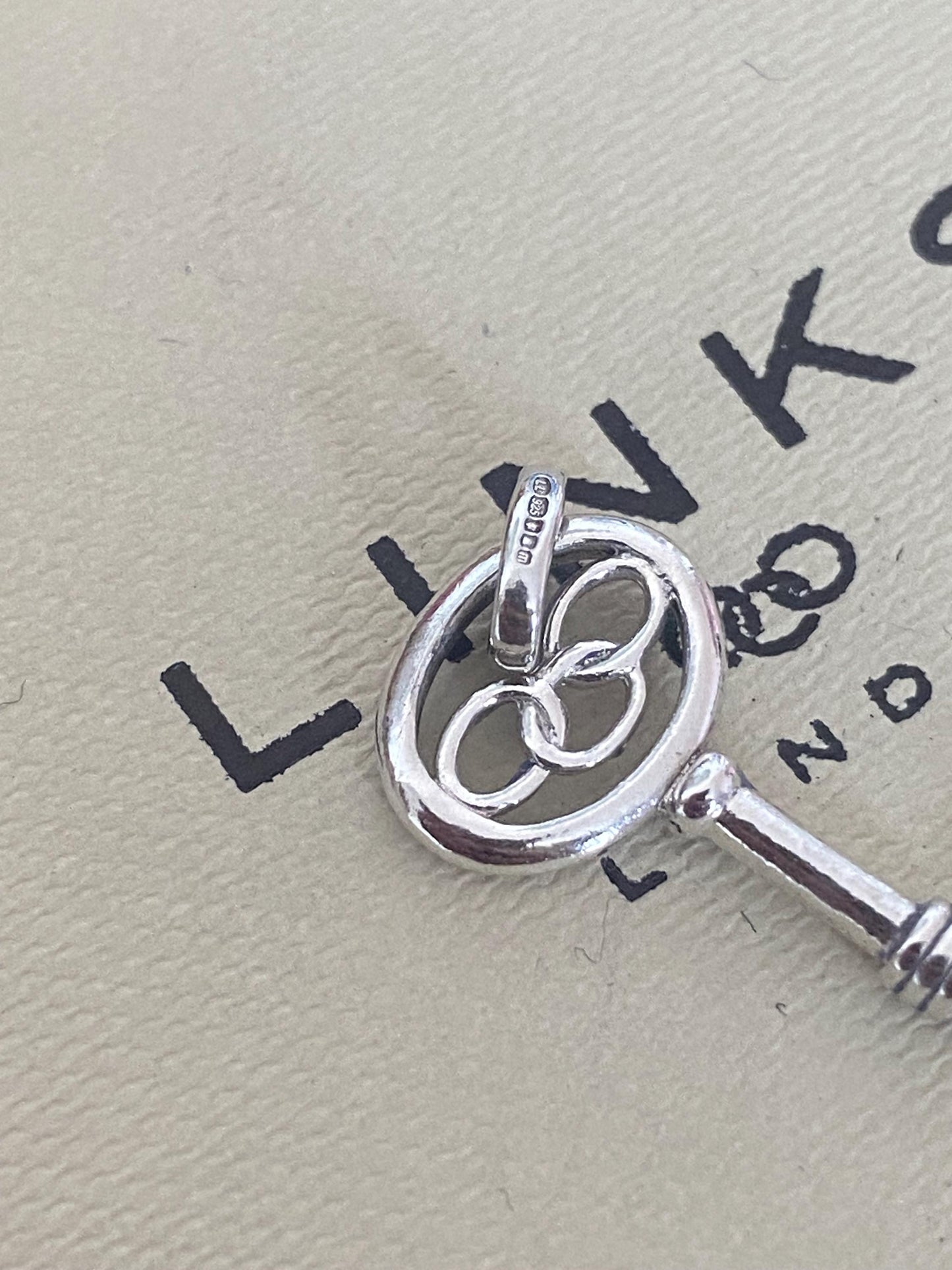 Beautiful genuine rare Links of London sterling silver key charm, assay hallmarked