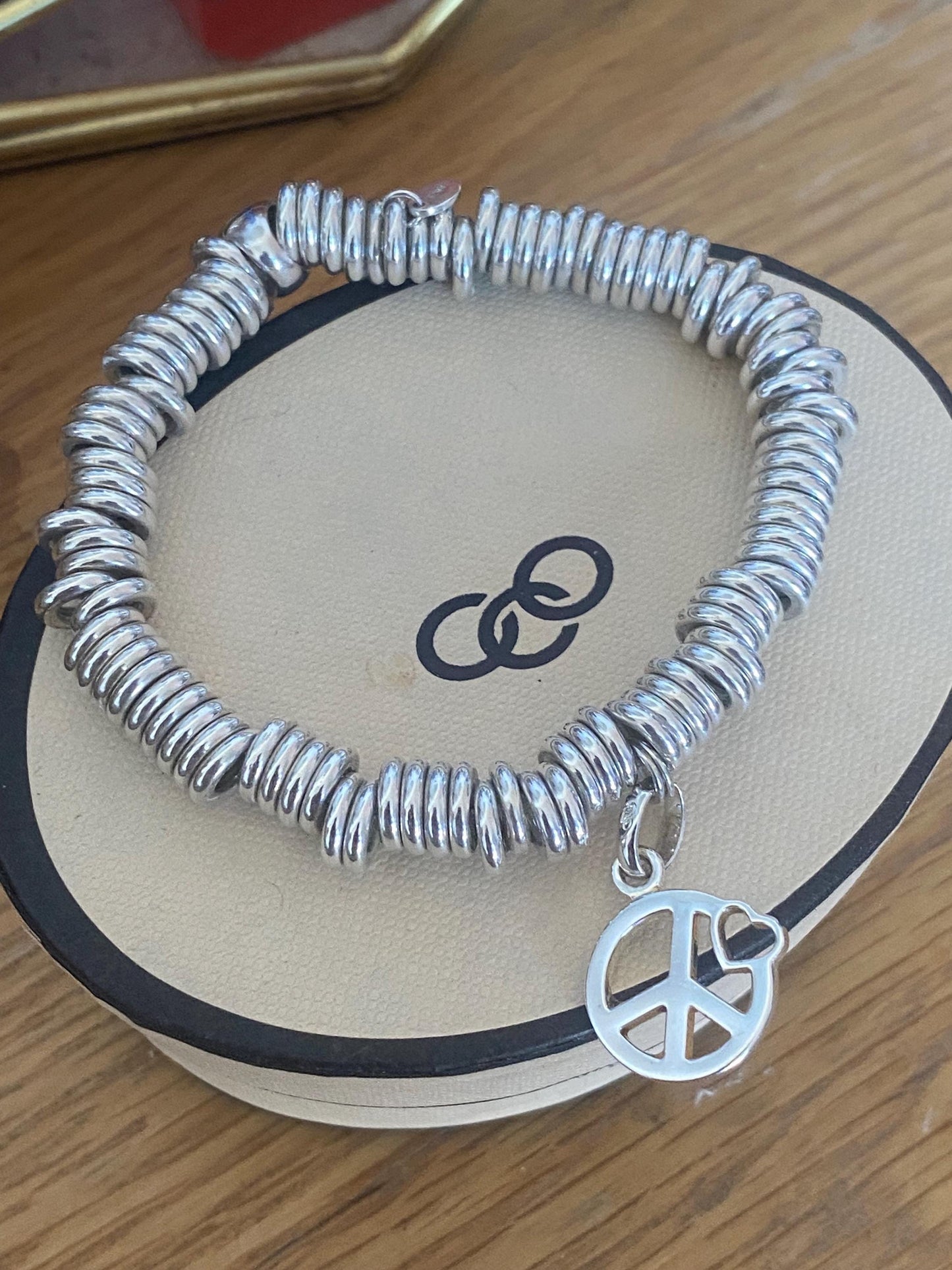 Lovely Links of London vintage rare sweetie bracelet witha peace heart charm, sterling silver, size medium, boxed