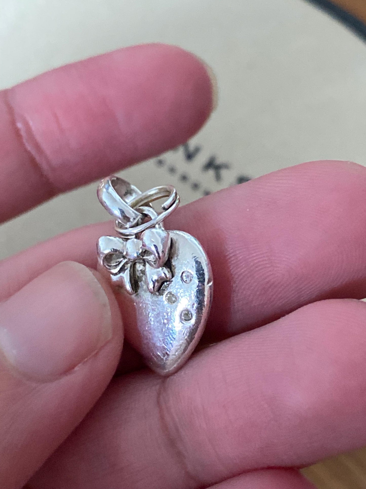 Beautiful genuine rare hallmarked Links of London sterling silver heart charm with bow and topaz stones