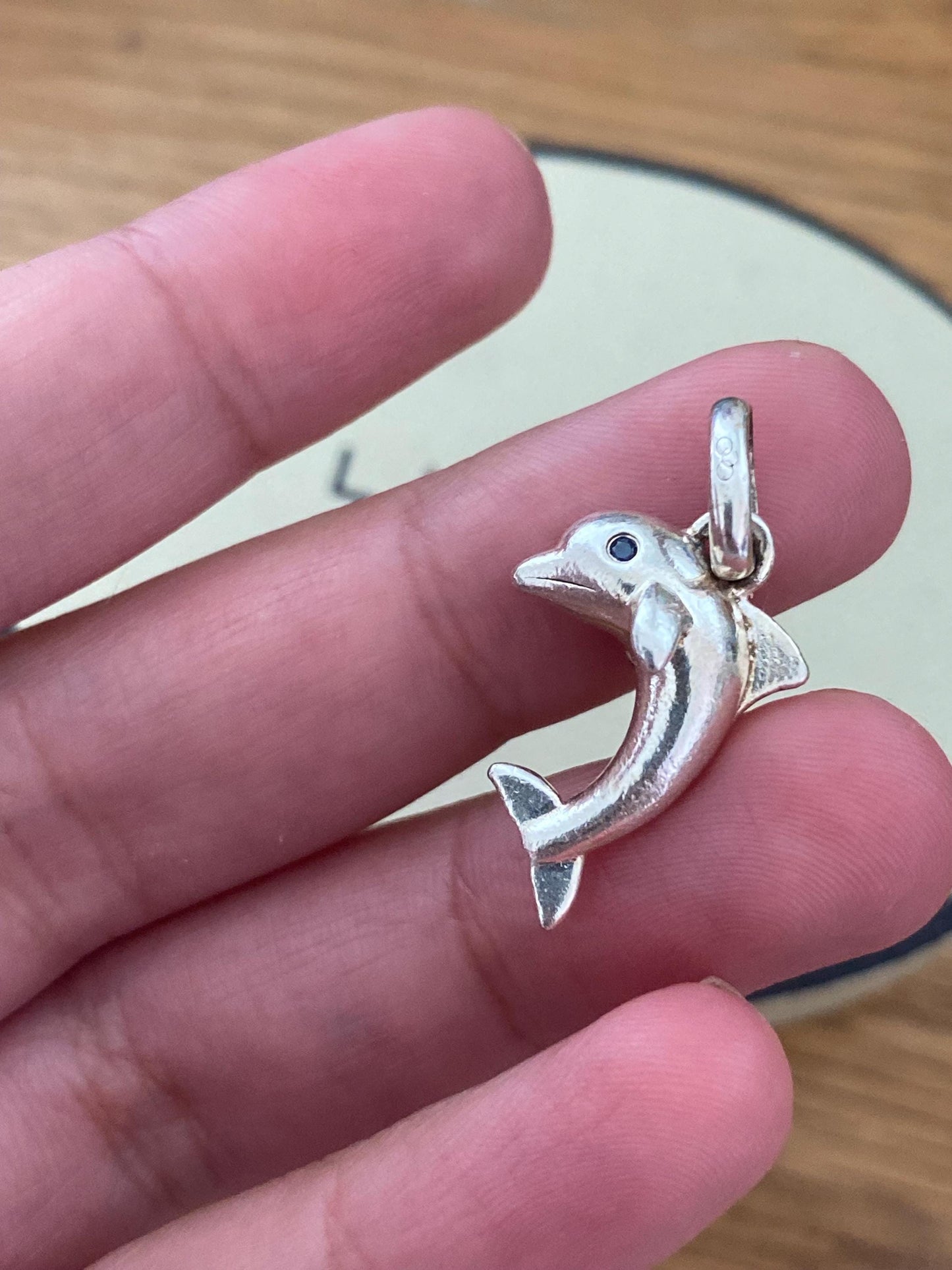 Stunning genuine rare Links of London sterling silver dolphin hallmarked charm with sapphire blue eyes
