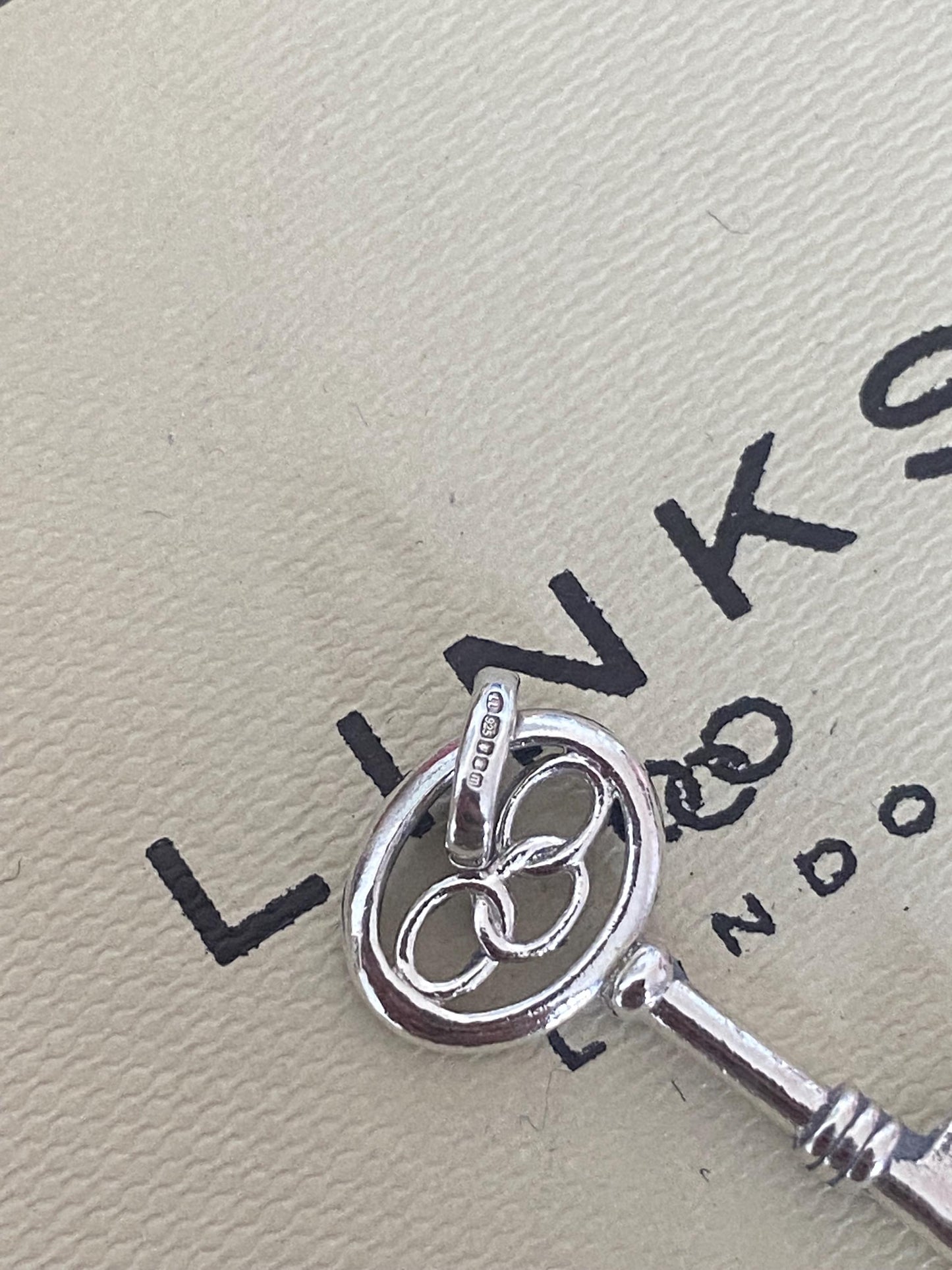 Beautiful genuine rare Links of London sterling silver key charm, assay hallmarked