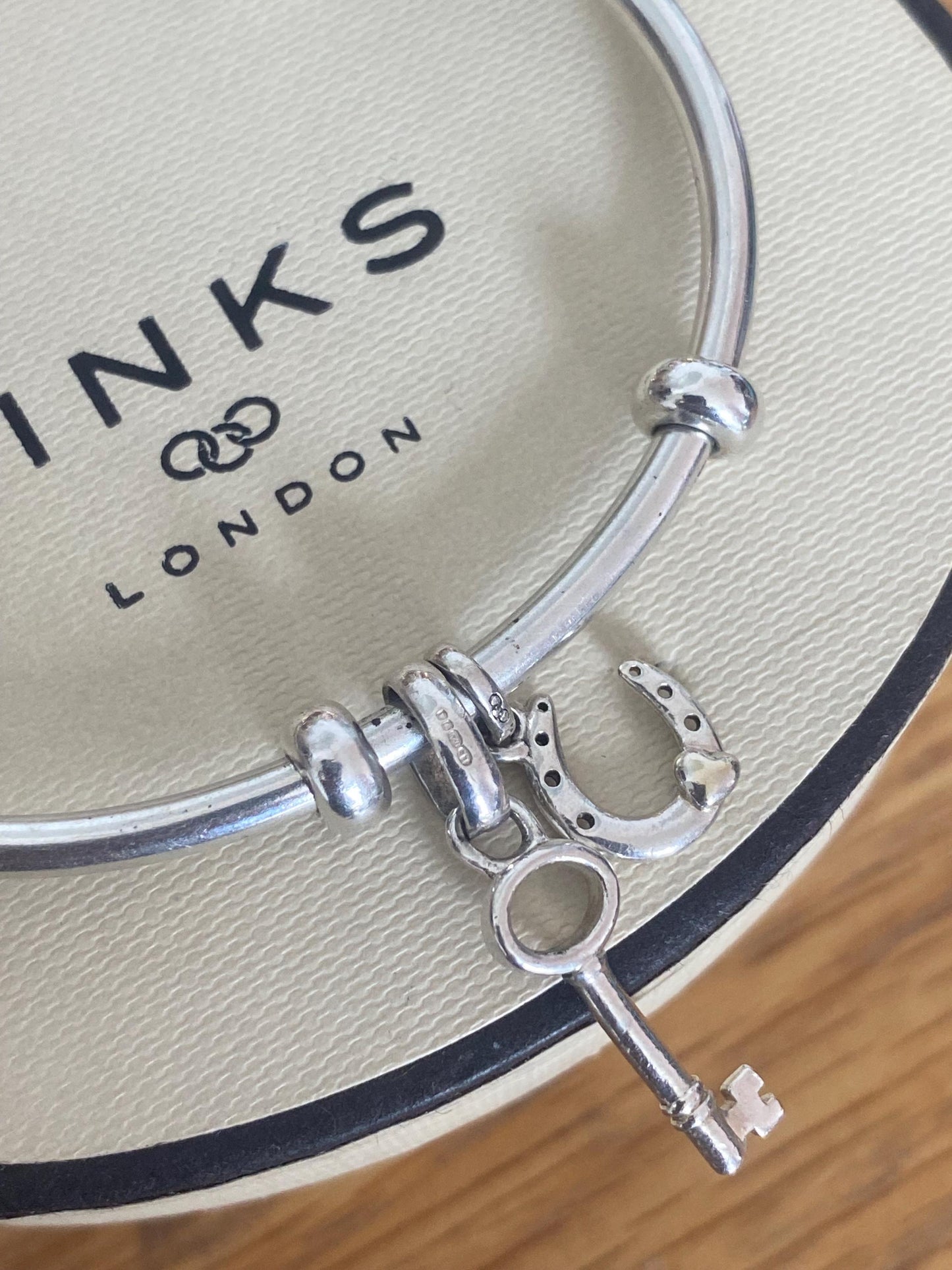 Genuine Links of London Sterling Silver Amulet Charm Cuff Bangle with two charms, Hallmarked, Medium Size, boxed