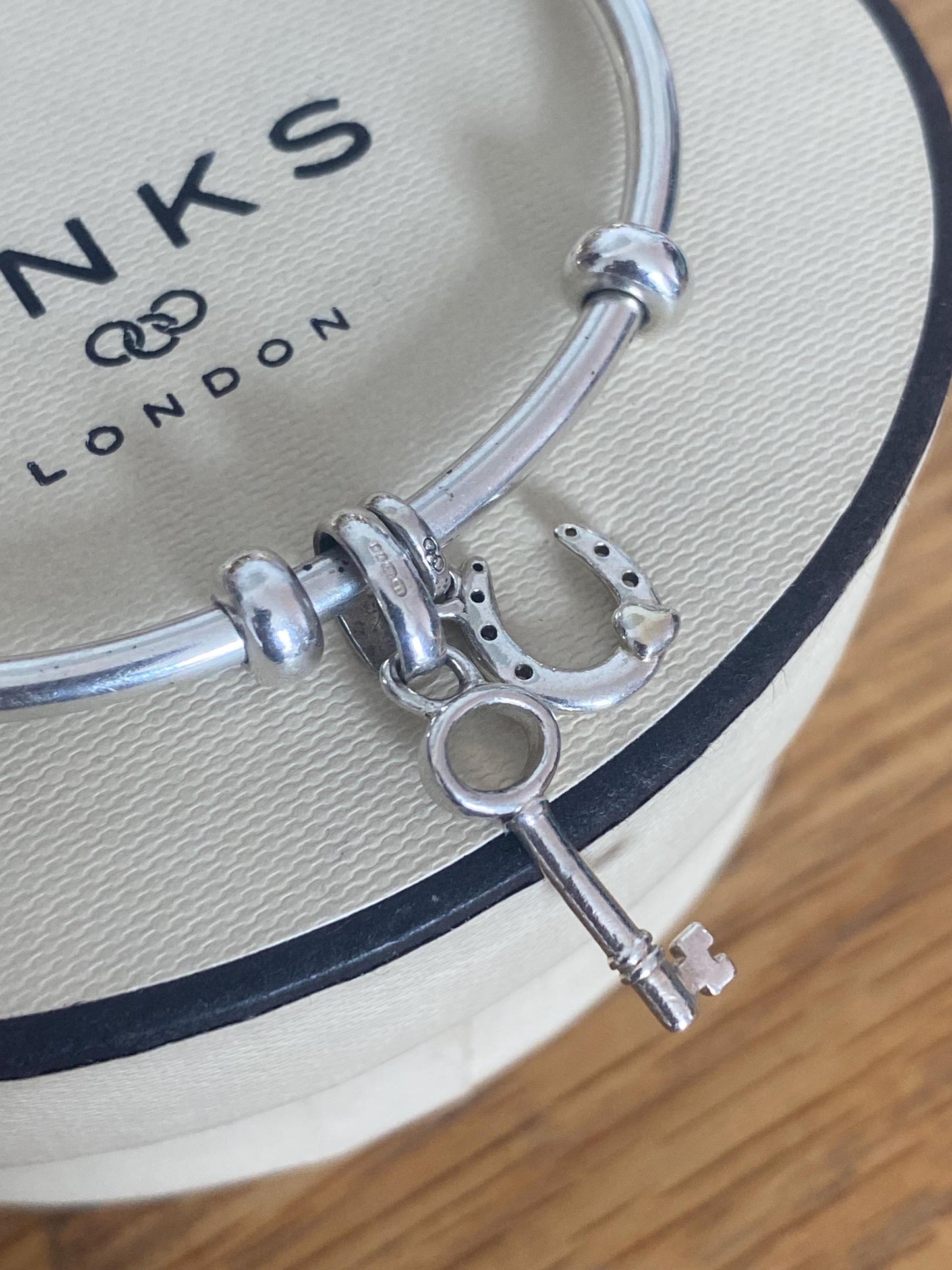 Genuine Links of London Sterling Silver Amulet Charm Cuff Bangle with two charms, Hallmarked, Medium Size, boxed