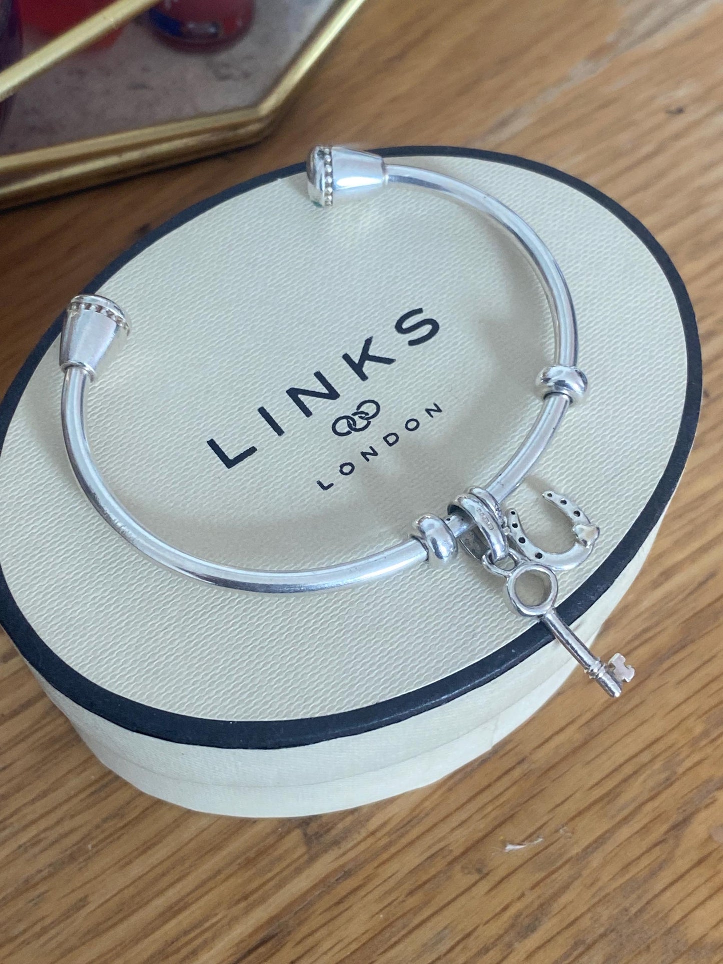 Genuine Links of London Sterling Silver Amulet Charm Cuff Bangle with two charms, Hallmarked, Medium Size, boxed