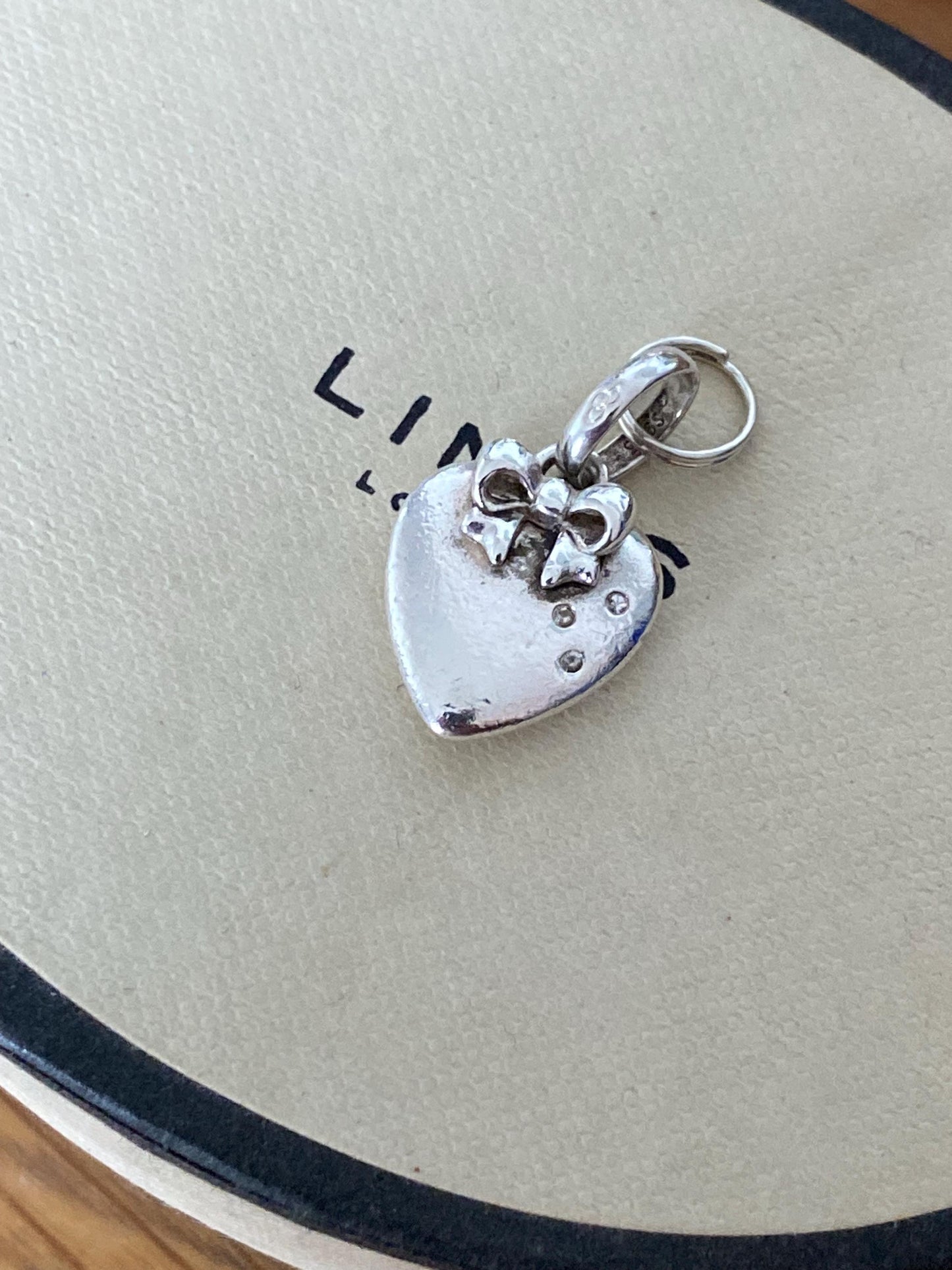 Beautiful genuine rare hallmarked Links of London sterling silver heart charm with bow and topaz stones