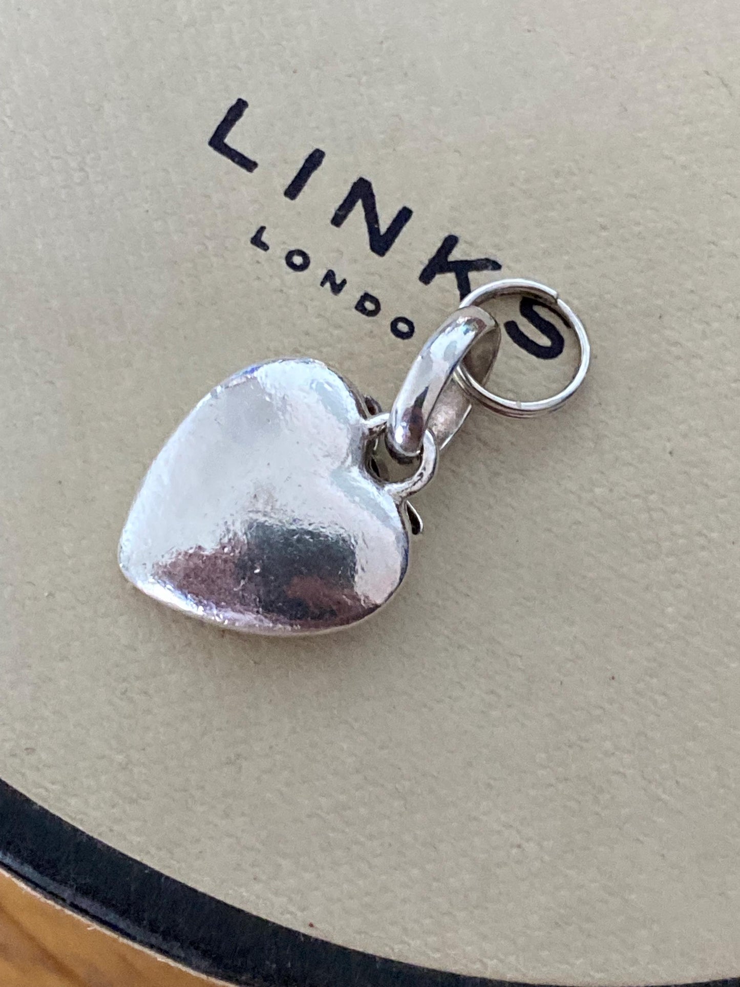 Beautiful genuine rare hallmarked Links of London sterling silver heart charm with bow and topaz stones