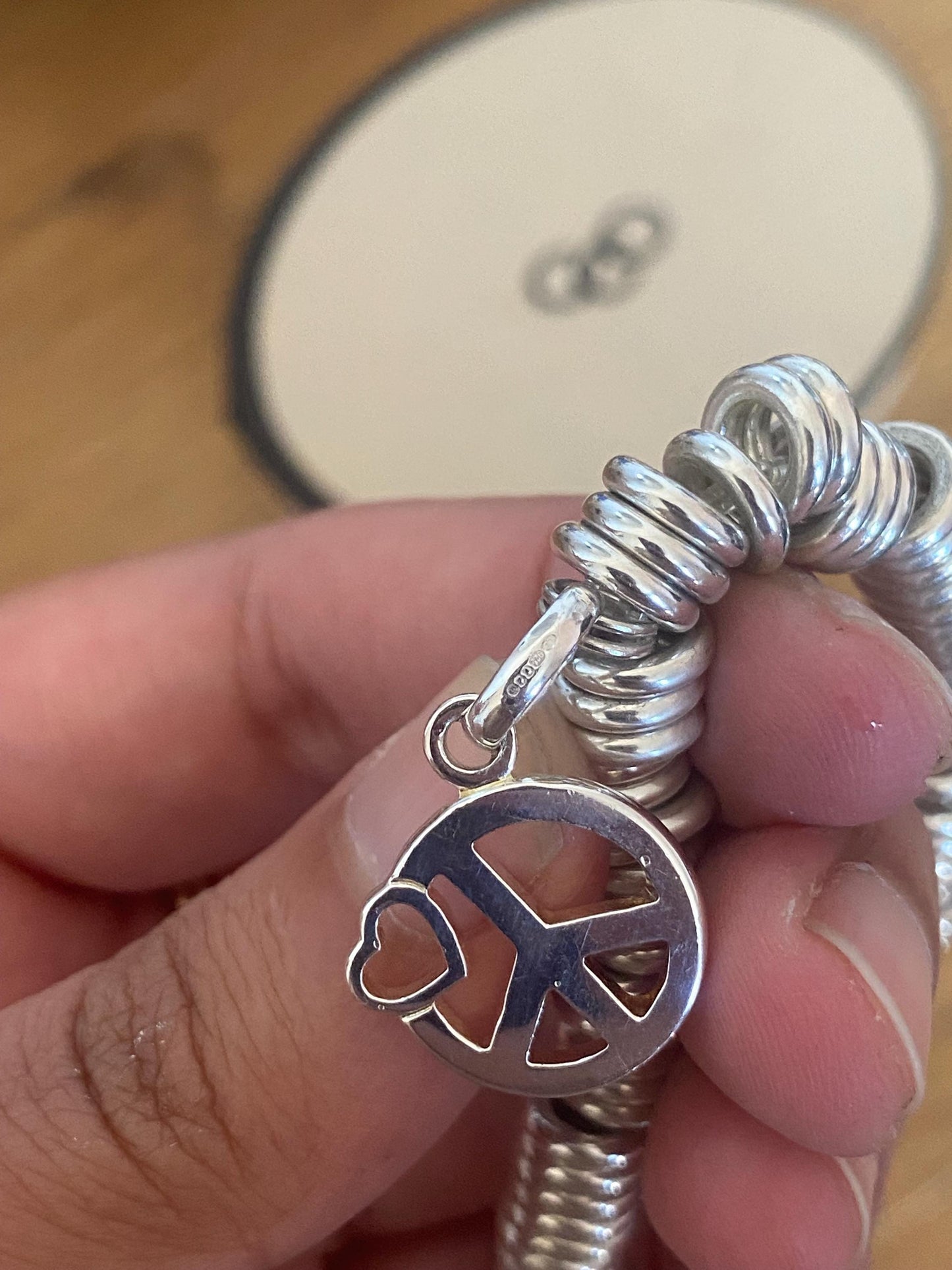 Lovely Links of London vintage rare sweetie bracelet witha peace heart charm, sterling silver, size medium, boxed