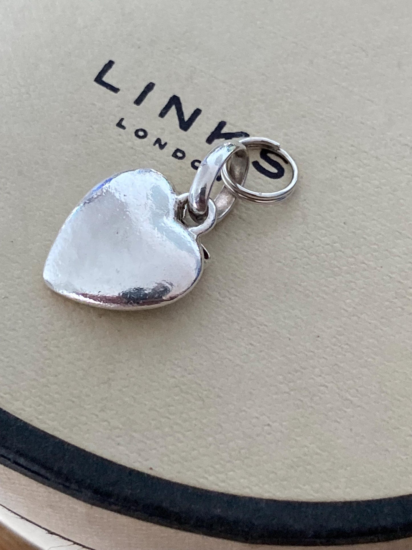 Beautiful genuine rare hallmarked Links of London sterling silver heart charm with bow and topaz stones