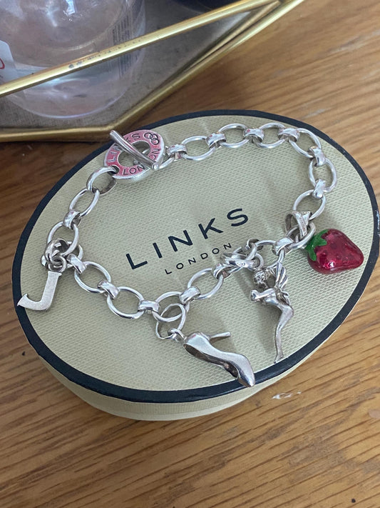 Gorgeous vintage and rare links of London toggle bracelet with 4 charms, hallmarked, sterling silver
