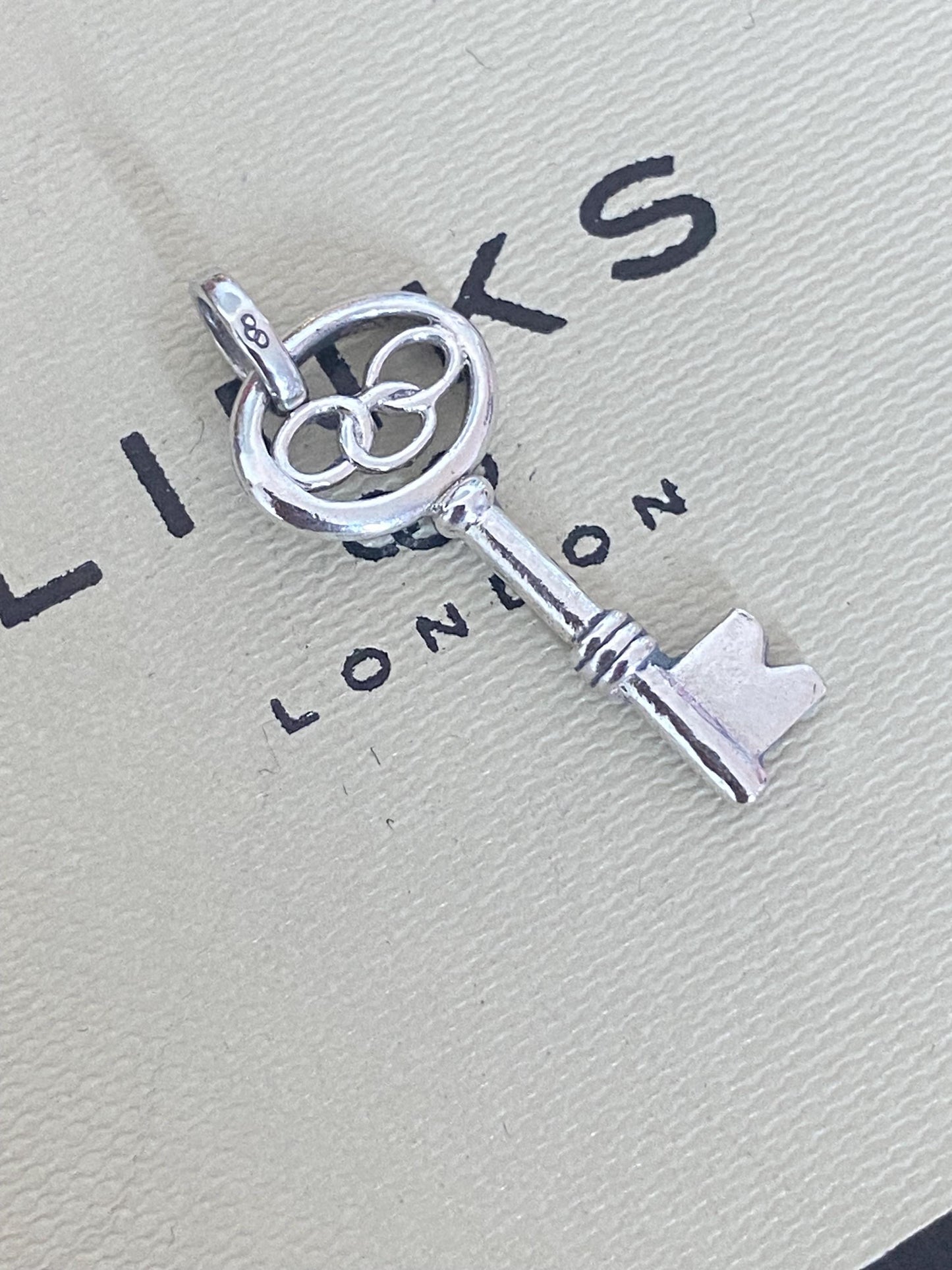 Beautiful genuine rare Links of London sterling silver key charm, assay hallmarked