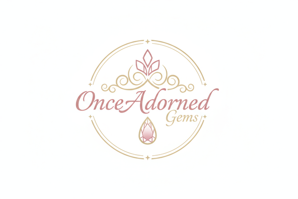 make a logo for a website selling premium jewellery. The company is called OnceAdornedGems. Make the logo pink and gold. Ensure the background is white. Make sure it looks professional. The gold used must be a pale gold